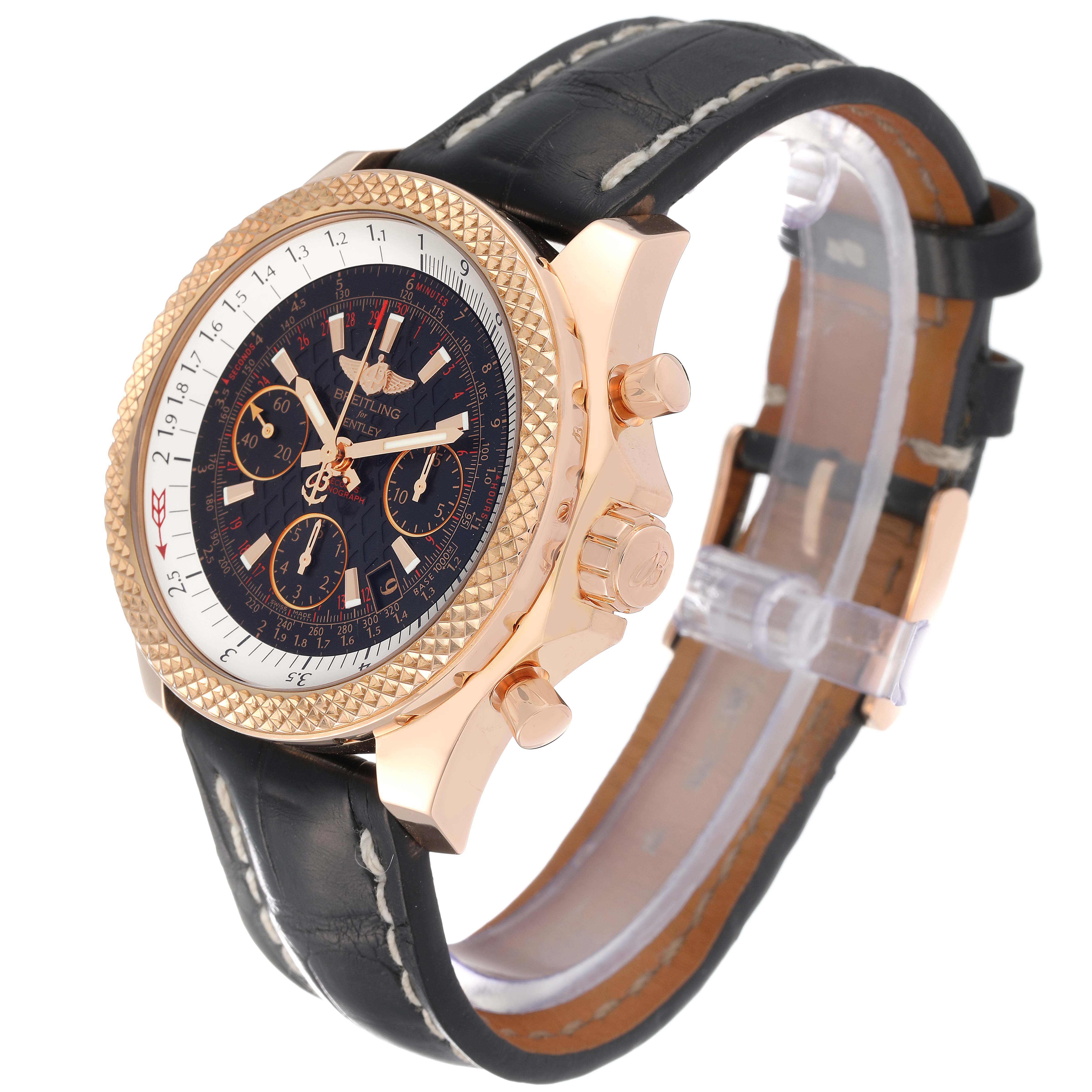 The Breitling Bentley RB061221/BE24-743P Men's Rose Gold Black Dial RB061221/BE24-743P Men's Rose Gold Black Dial watch is shown in a side angle, highlighting the face, bezel, case, and leather strap.