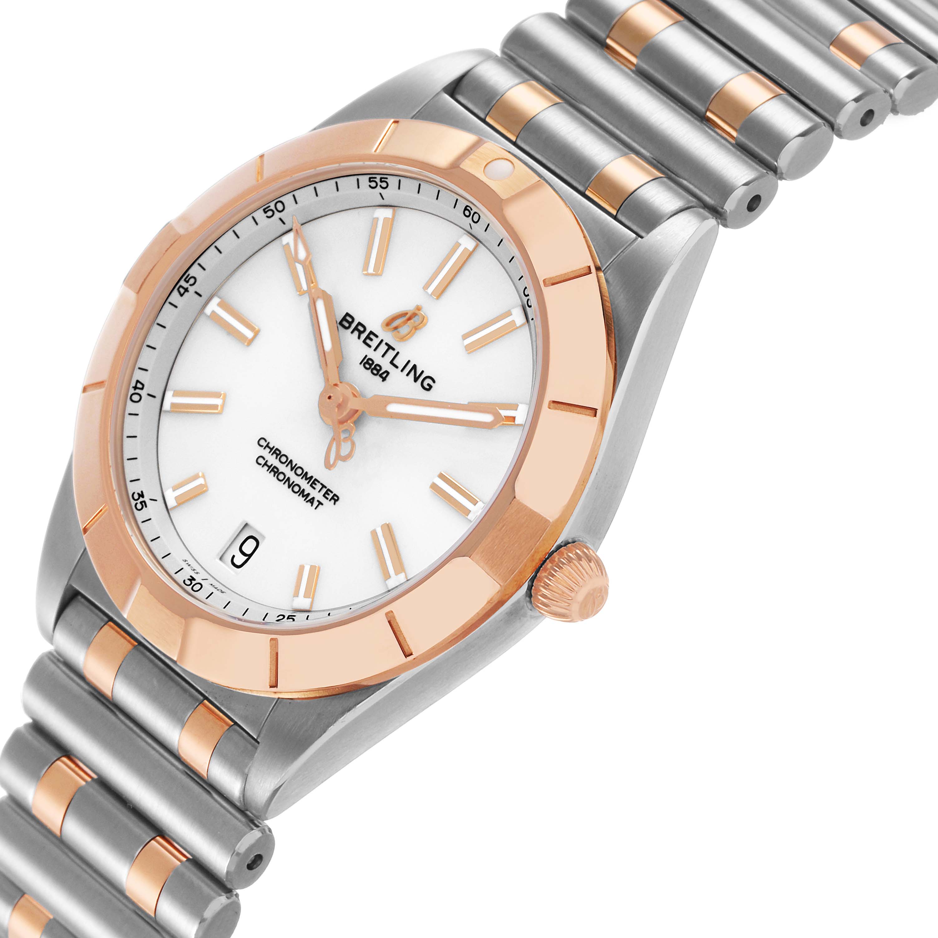 The Breitling A77310591A1A1 Womens Steel and Gold (two tone) Silver Dial Chronomat 32 Steel Rose Gold Ladies Watch A77310 is shown at an angle highlighting the dial, bezel, and bracelet.
