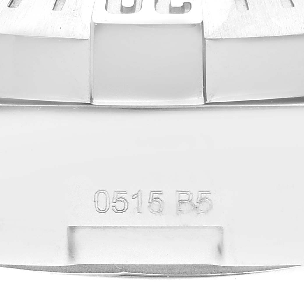This image shows a close-up of the underside of the bezel on a Breitling Colt A13388 Men's Stainless Steel White Dial A13388 Men's Stainless Steel White Dial watch.