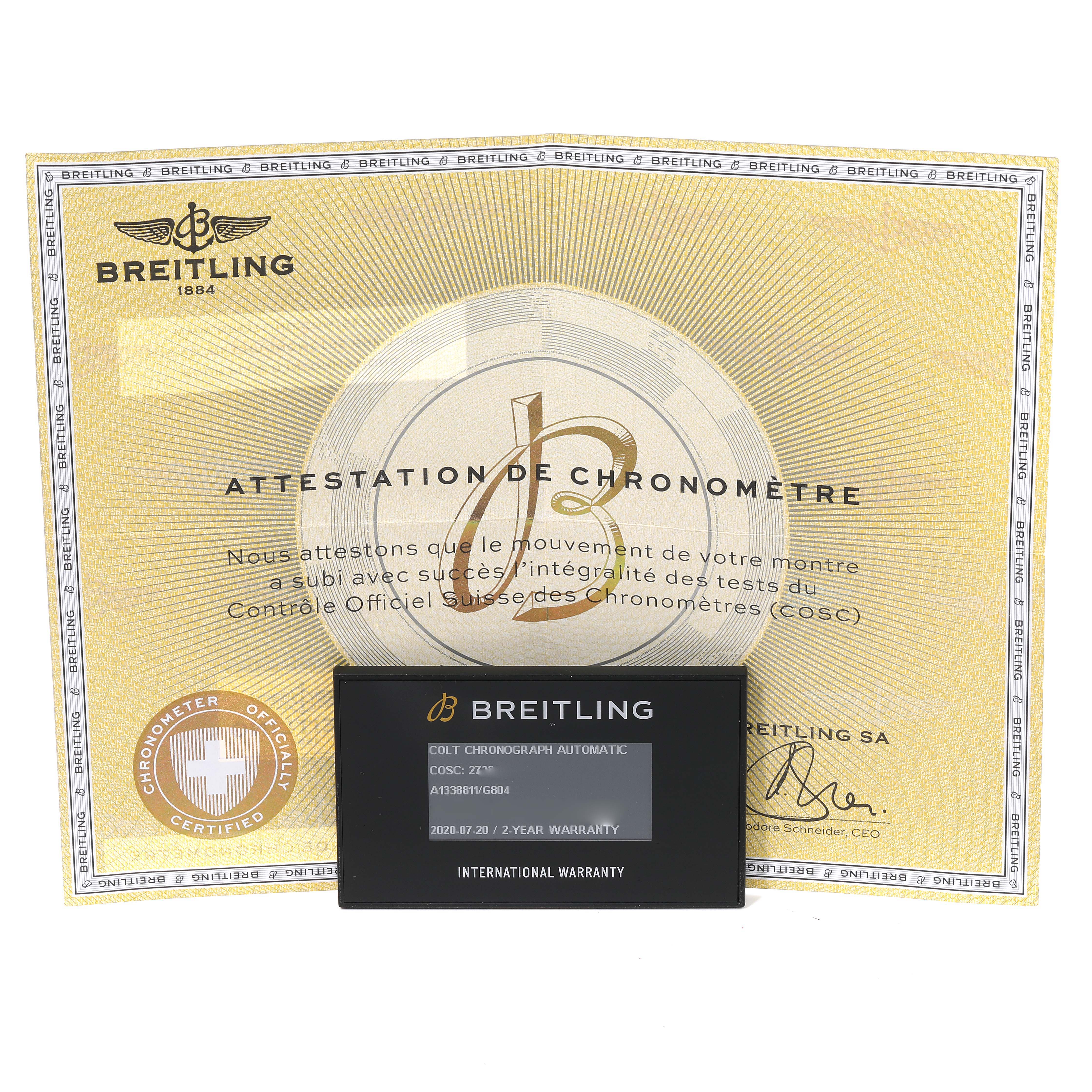 The image shows the warranty card and chronometer certificate for the Breitling Colt A13388 Men's Stainless Steel White Dial A13388 Men's Stainless Steel White Dial model watch.