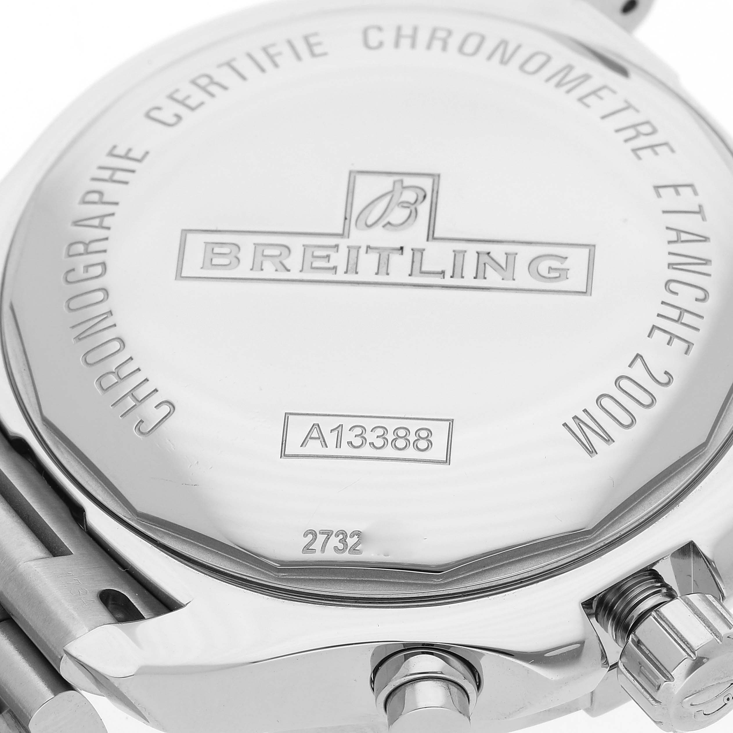 This image shows the case back and part of the crown of a Breitling Colt A13388 Men's Stainless Steel White Dial A13388 Men's Stainless Steel White Dial watch, highlighting the engravings and serial number.