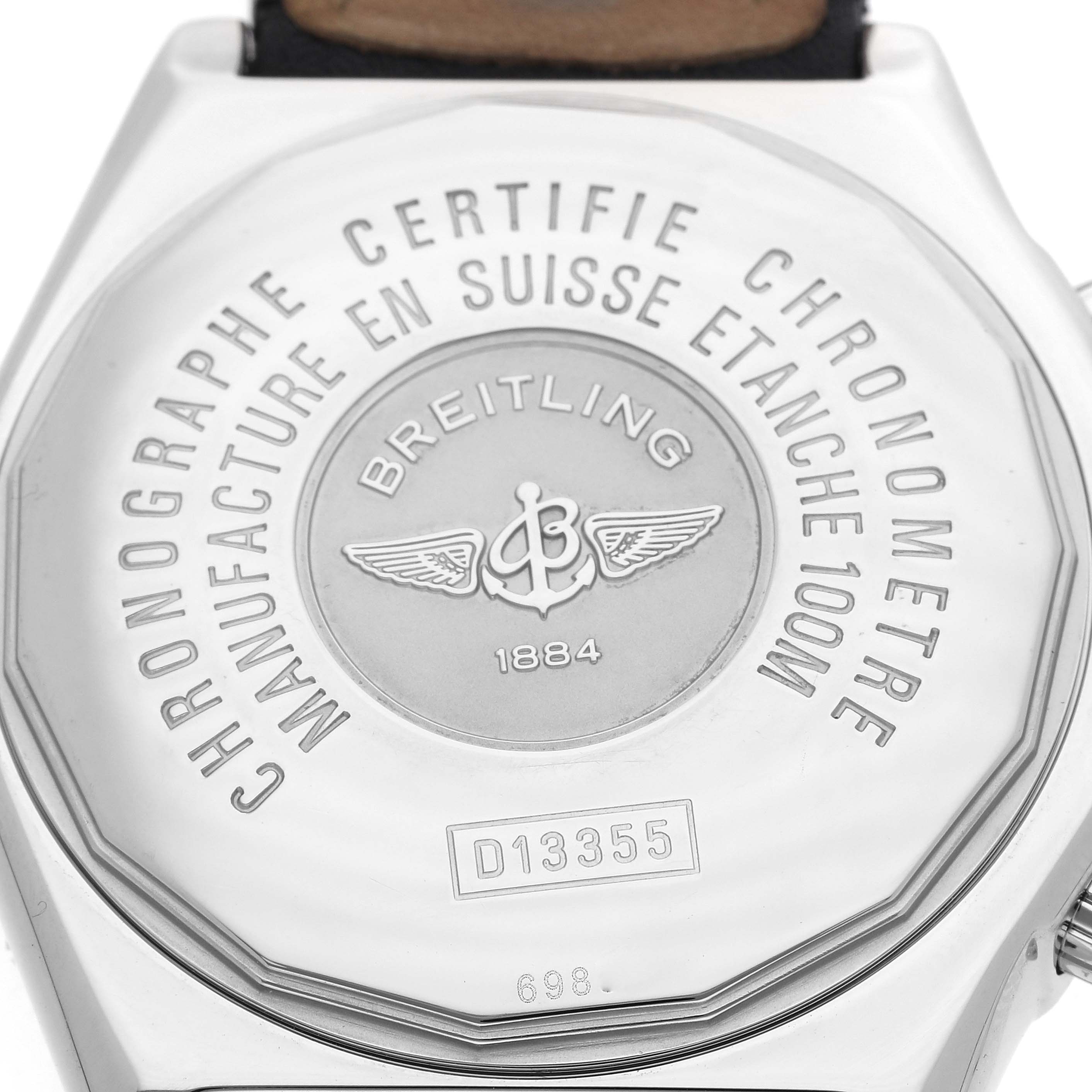 The image shows the back of a Breitling Windrider D1335512 Men
s Steel and Gold (two tone) Black Dial D1335512 Men
s Steel and Gold (two tone) Black Dial watch, displaying its engraved logo and specifications.