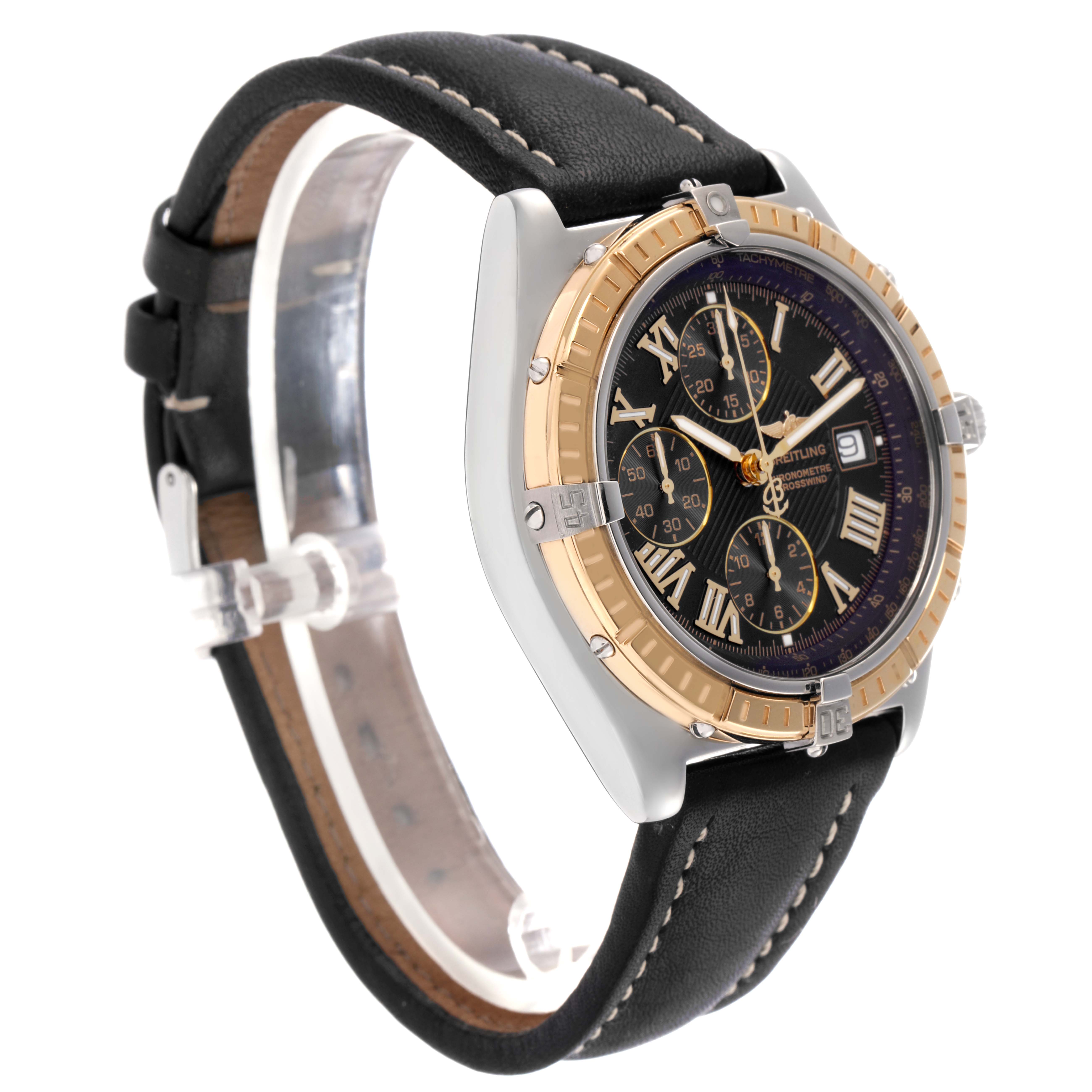 The Breitling Windrider D1335512 Men
s Steel and Gold (two tone) Black Dial D1335512 Men
s Steel and Gold (two tone) Black Dial watch is shown at a three-quarter angle, highlighting the face, bezel, and leather strap.