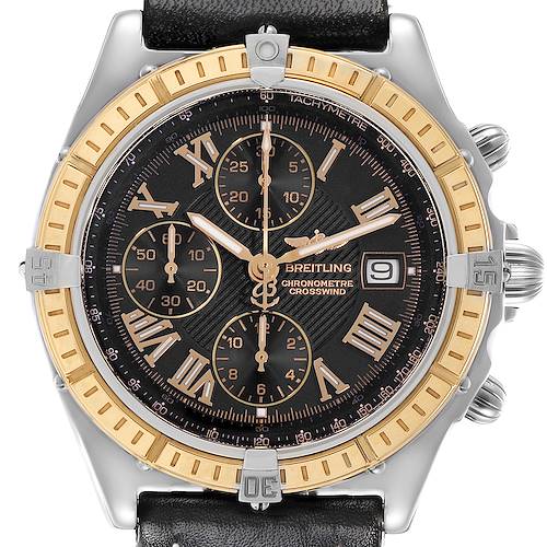 The Breitling Windrider watch is shown from a front angle, displaying its dial, bezel, subdials, and leather strap.