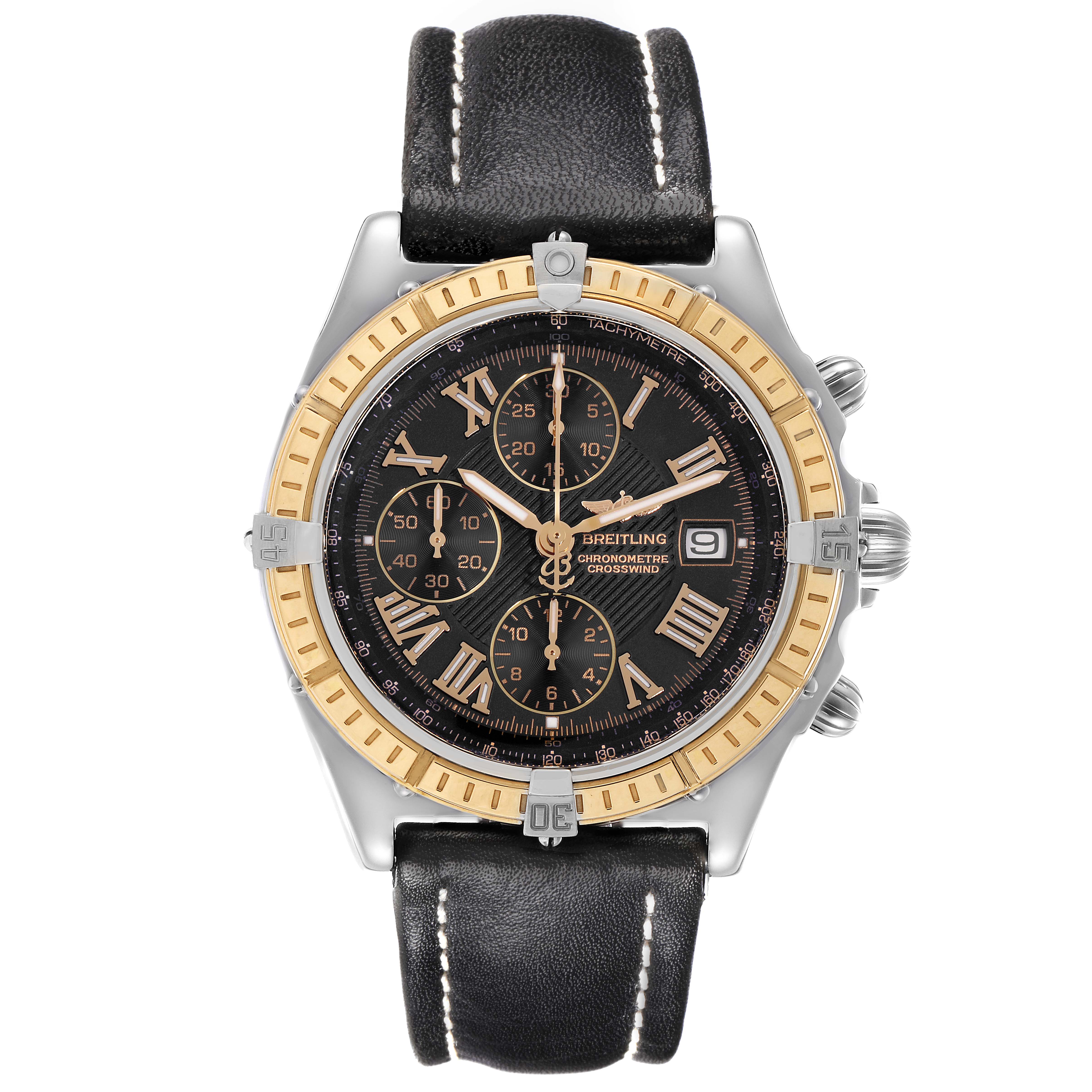 The Breitling Windrider D1335512 Men
s Steel and Gold (two tone) Black Dial D1335512 Men
s Steel and Gold (two tone) Black Dial watch is shown from a front angle, displaying its dial, bezel, and leather strap.