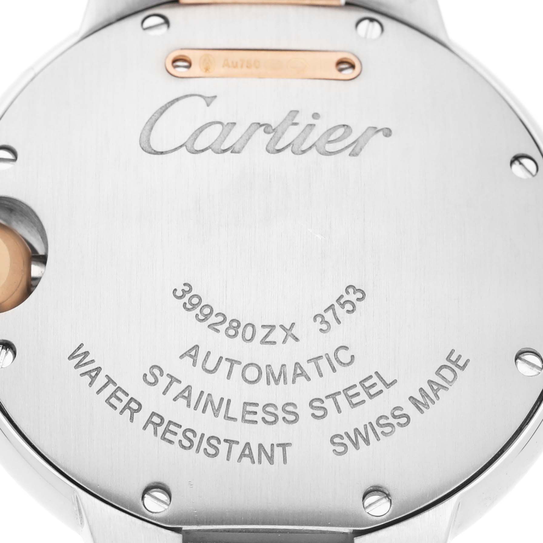 The image shows the back of a Cartier Ballon Bleu WE902077 Women's Steel and Gold (two tone) Silver Dial watch, highlighting the brand, model details, and material specifications.