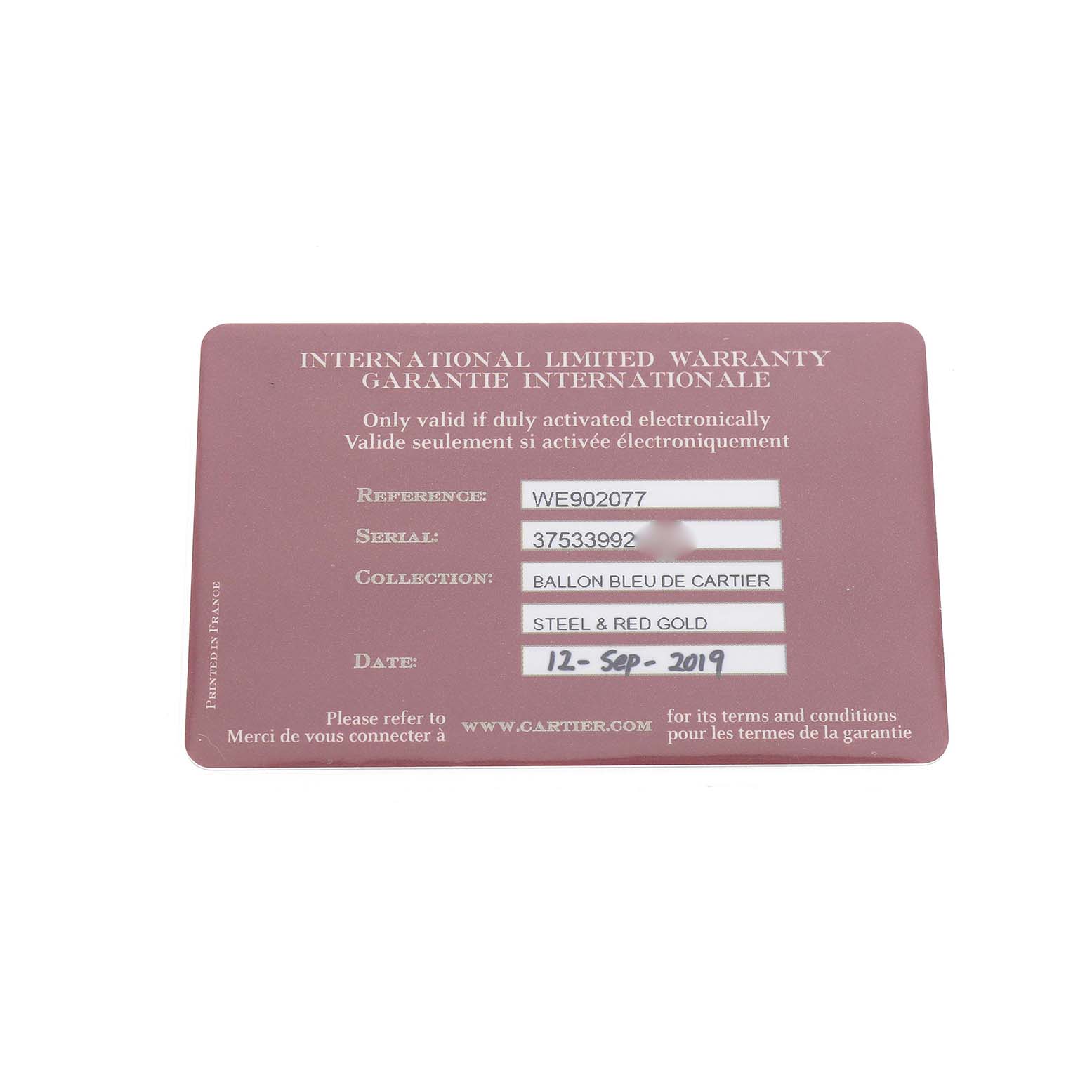 The image shows an International Limited Warranty card for the Ballon Bleu by Cartier, detailing reference, serial number, and date.