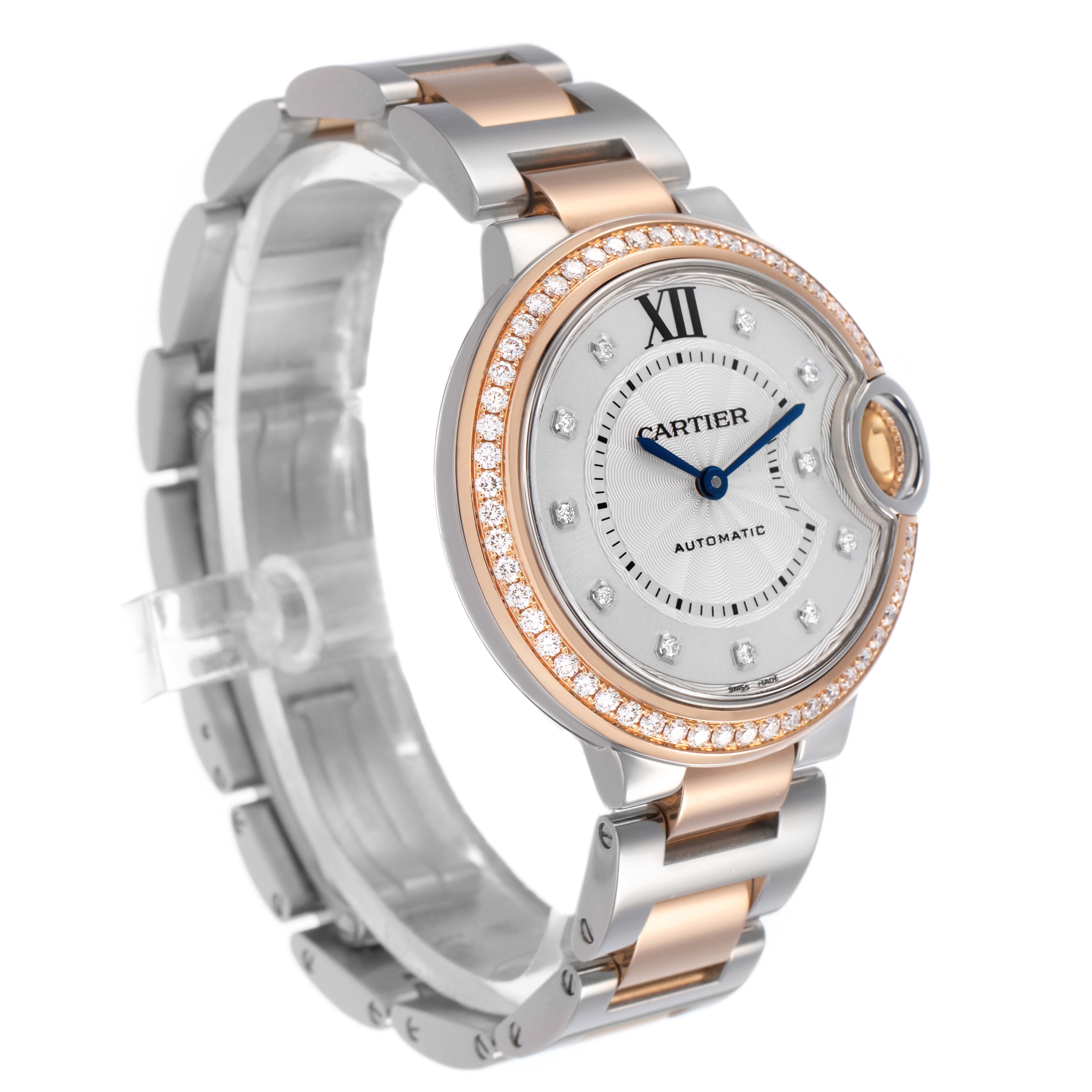 The Ballon Bleu de Cartier watch is shown at a three-quarter angle, displaying its face, bezel, and part of the bracelet.