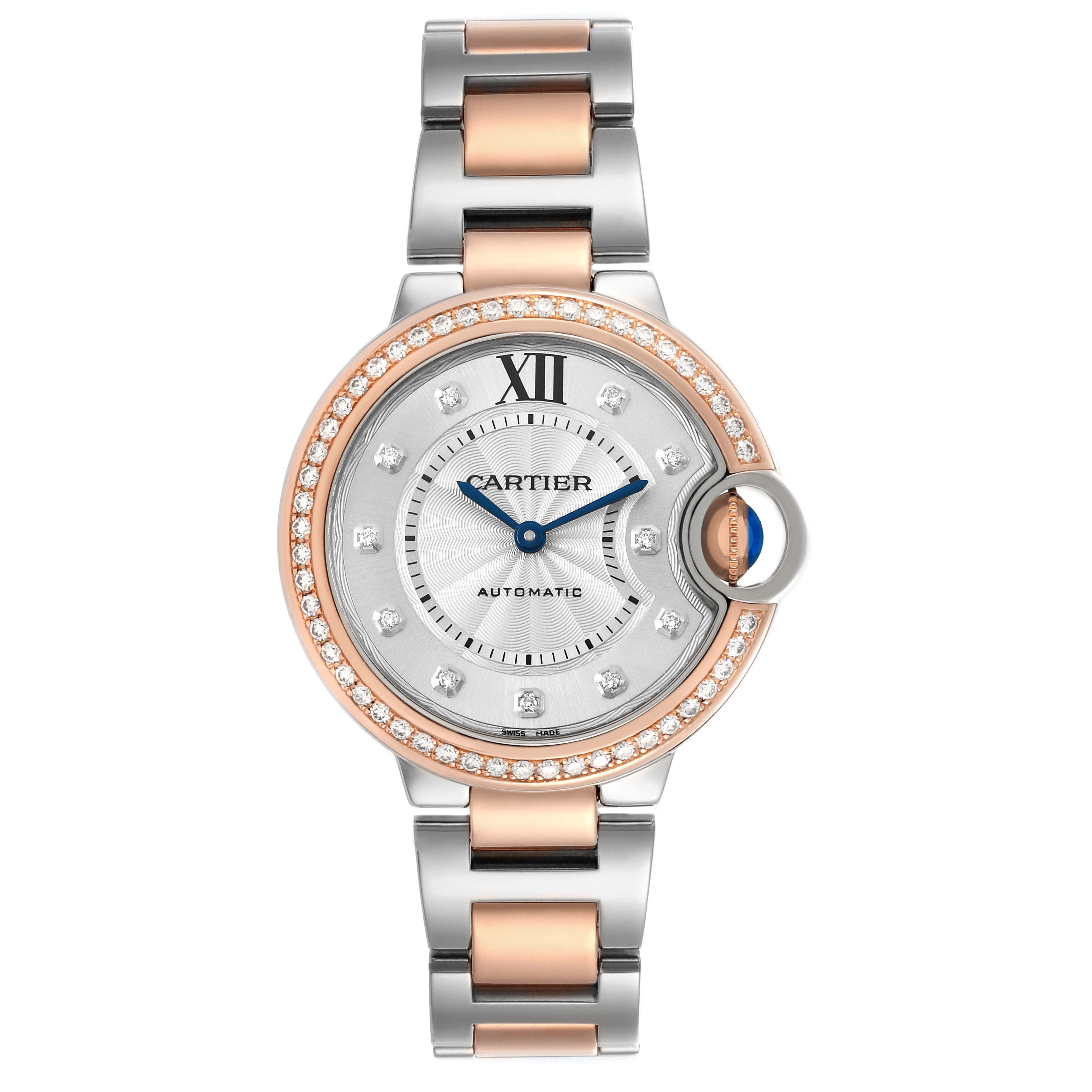 The Ballon Bleu by Cartier is shown from a top-down angle, highlighting its round face, blue hands, diamond markers, and mixed metal bracelet.