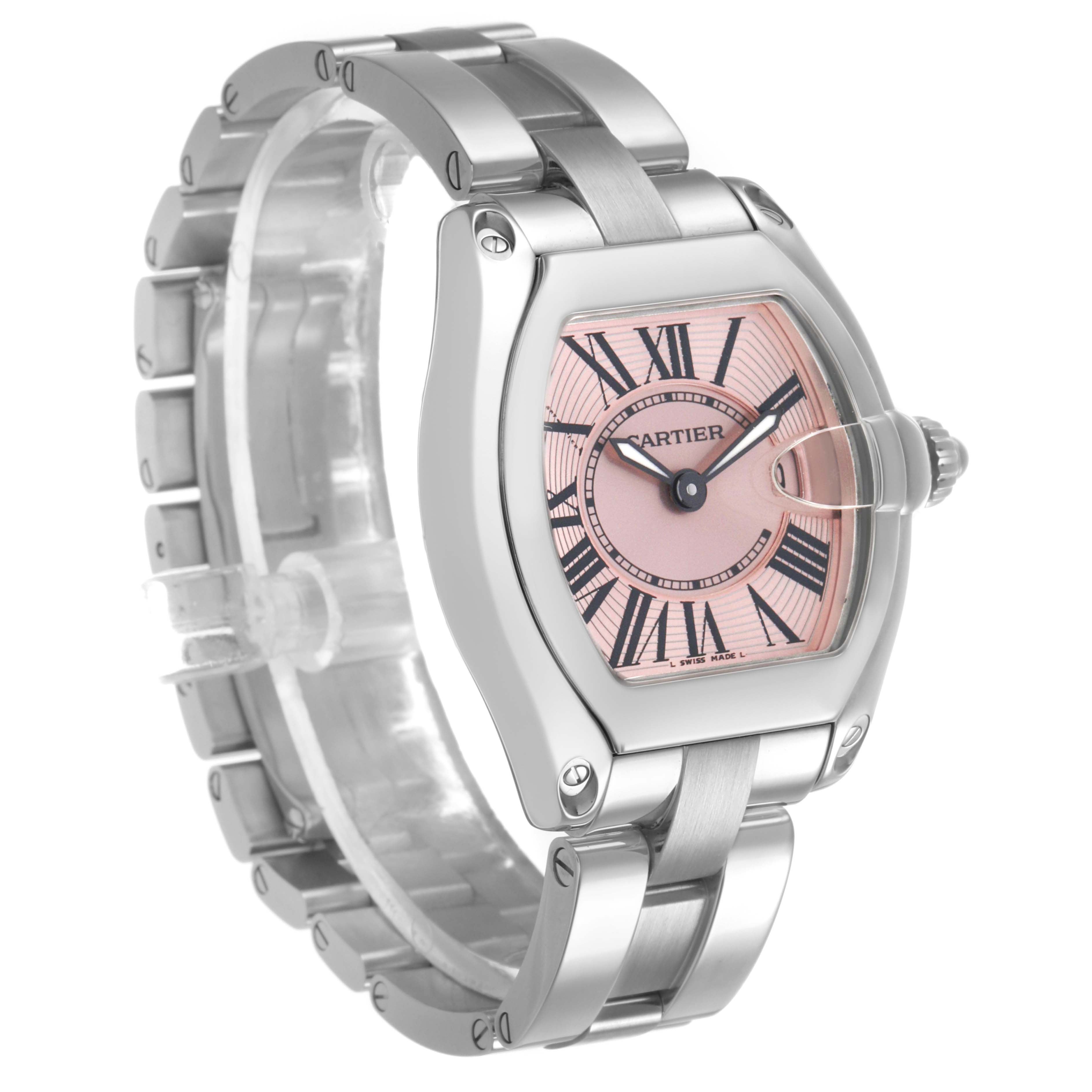 The Cartier Ballon Bleu W62017V3 Women's Stainless Steel Pink Dial watch is shown at an angled side view, highlighting the case, Roman numeral dial, and metal bracelet.