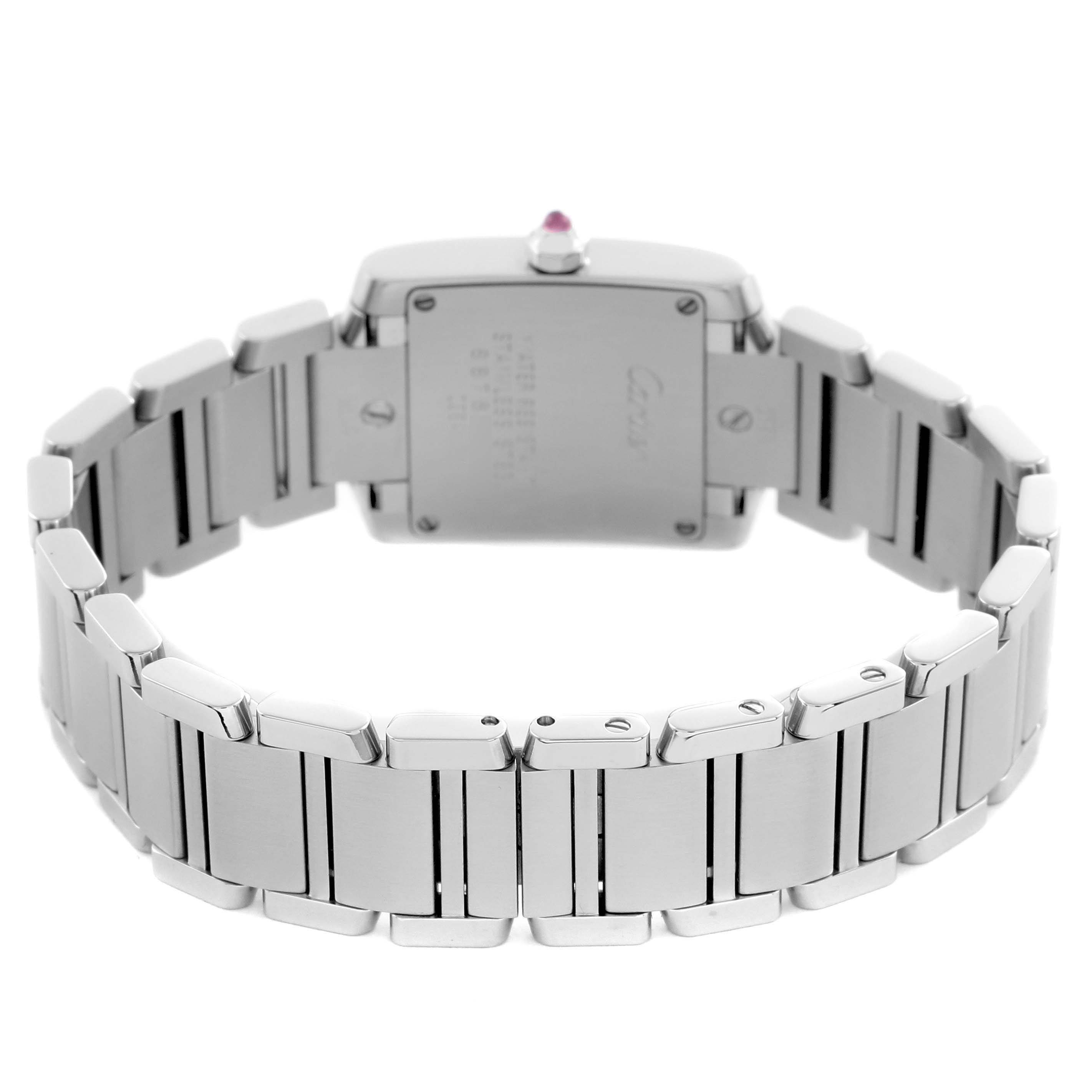 The image shows the back of a Cartier Tank Française watch, highlighting the metal bracelet and case back.