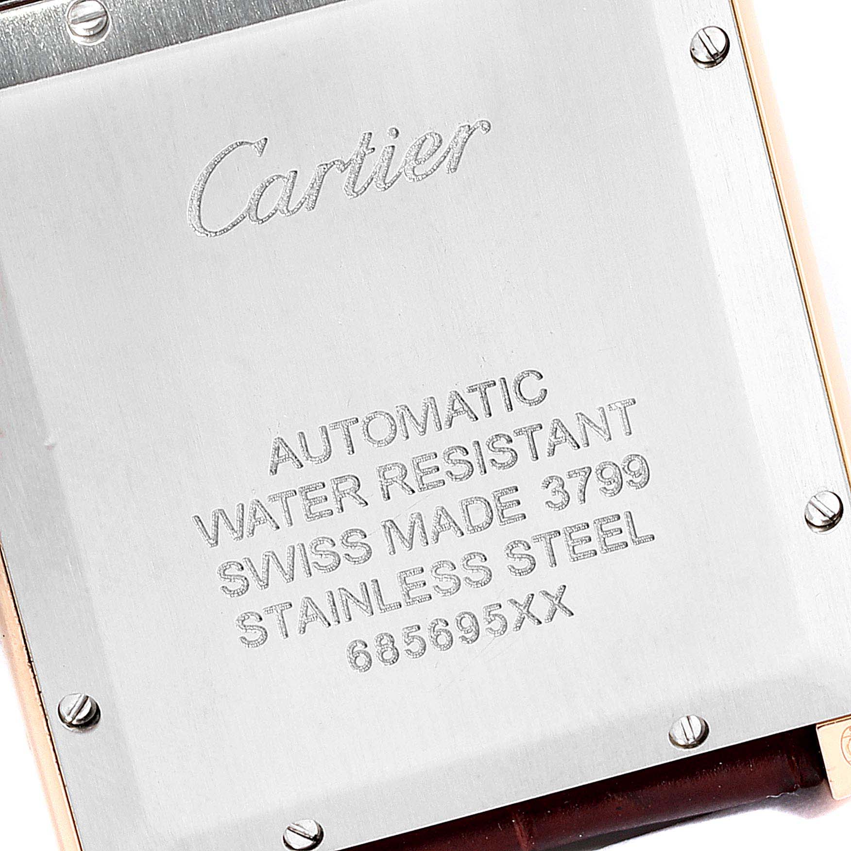 This close-up shows the back of the Cartier Tank Solo W5200026 Men's Rose Gold Silver Dial W5200026 Men's Rose Gold Silver Dial watch, highlighting its stainless steel case and engravings.