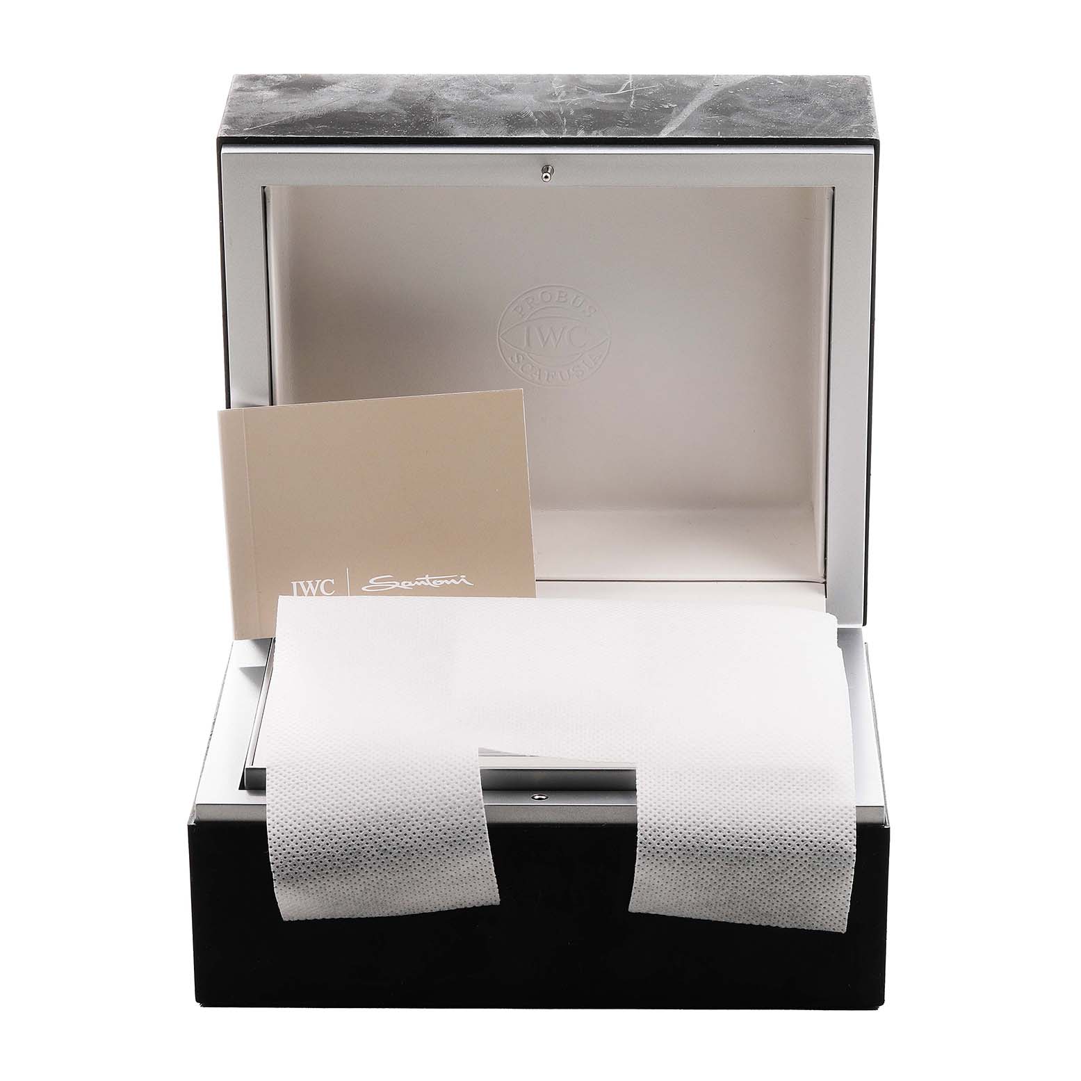 The image shows an open IWC Pilot IW377710 Men's Stainless Steel Black Dial watch box with an instruction booklet, viewed from the front.