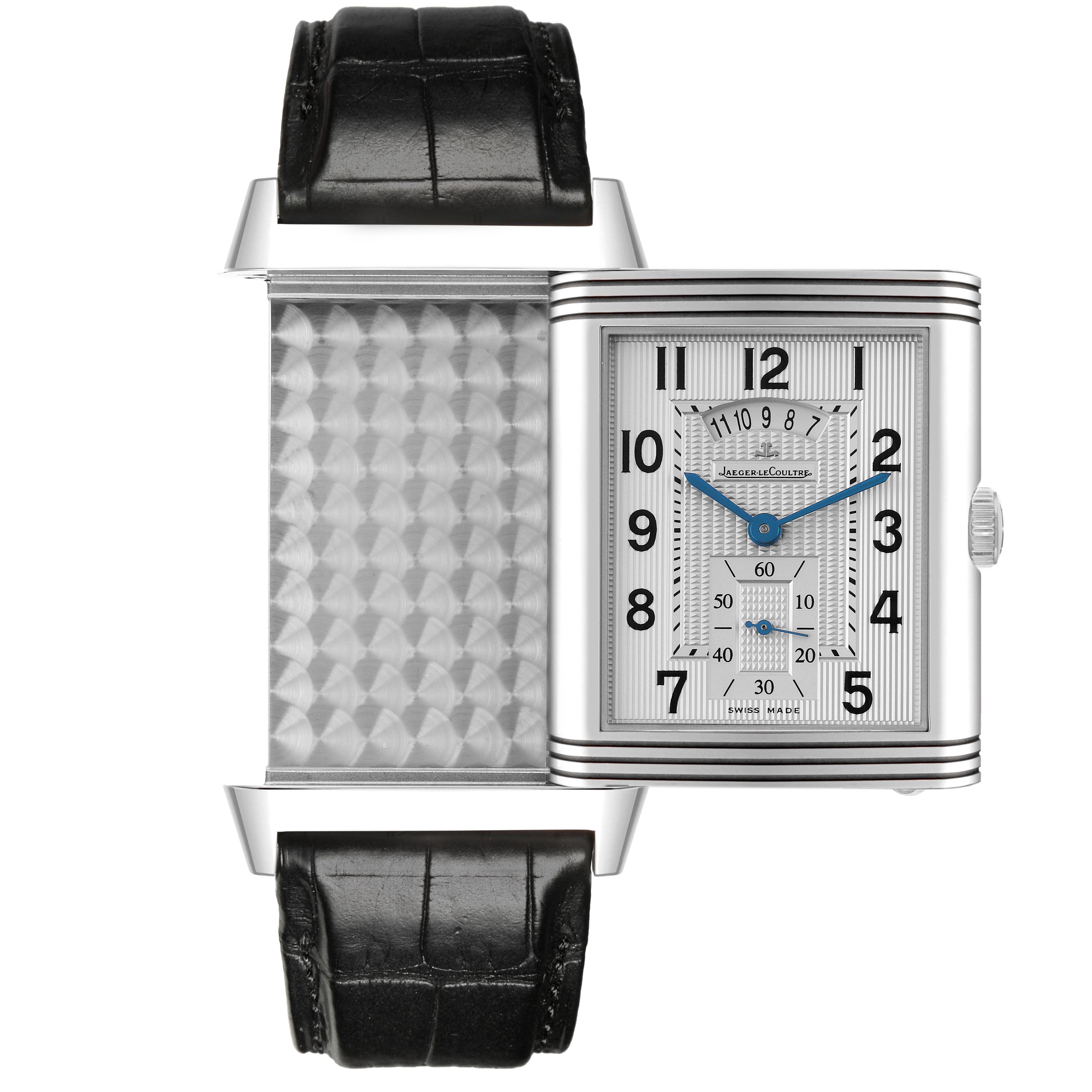 The Jaeger-LeCoultre Reverso watch is shown from the front, displaying its reversible case and dial, along with part of the strap.