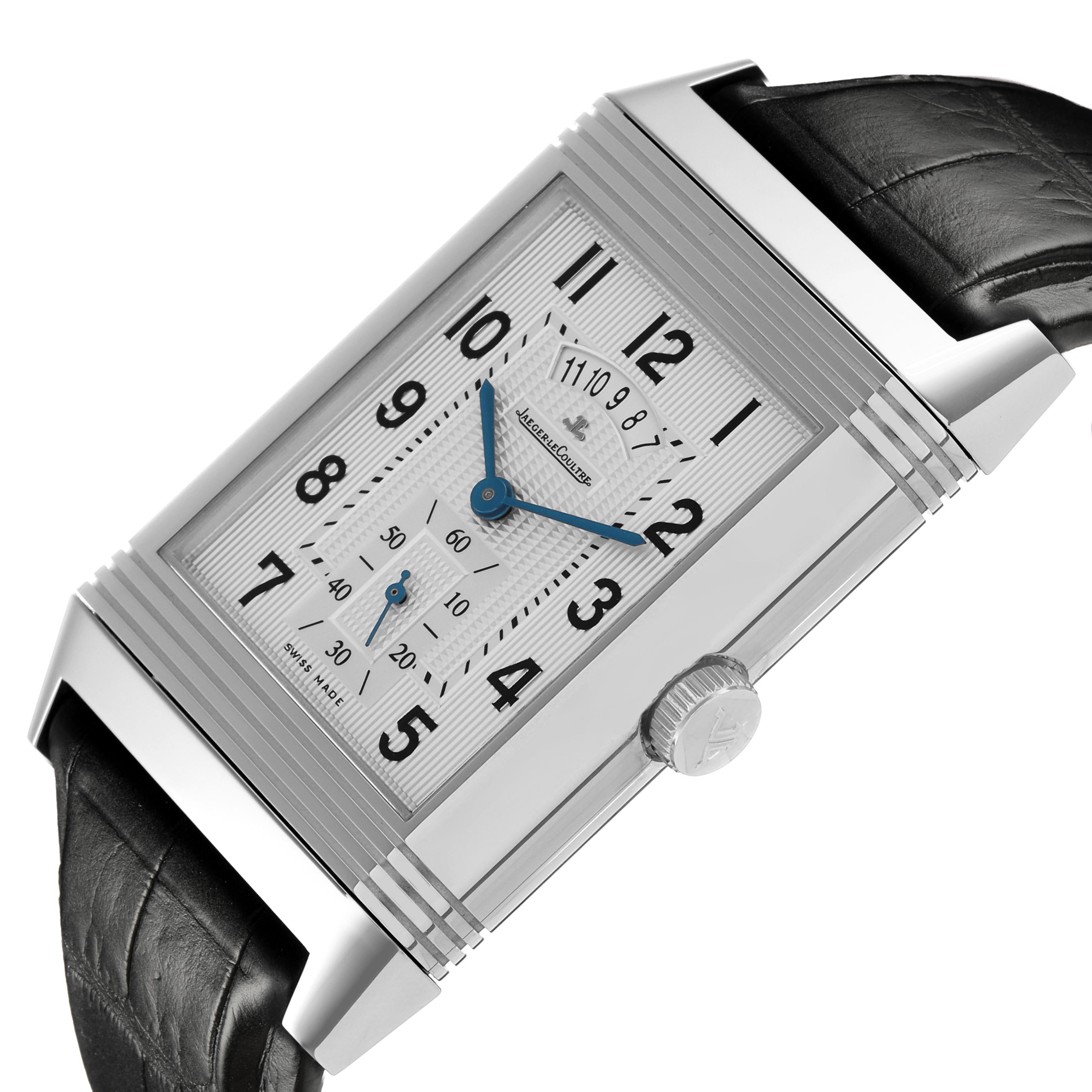 The Jaeger-LeCoultre Reverso watch is shown at a tilted angle highlighting the dial, crown, and leather strap.