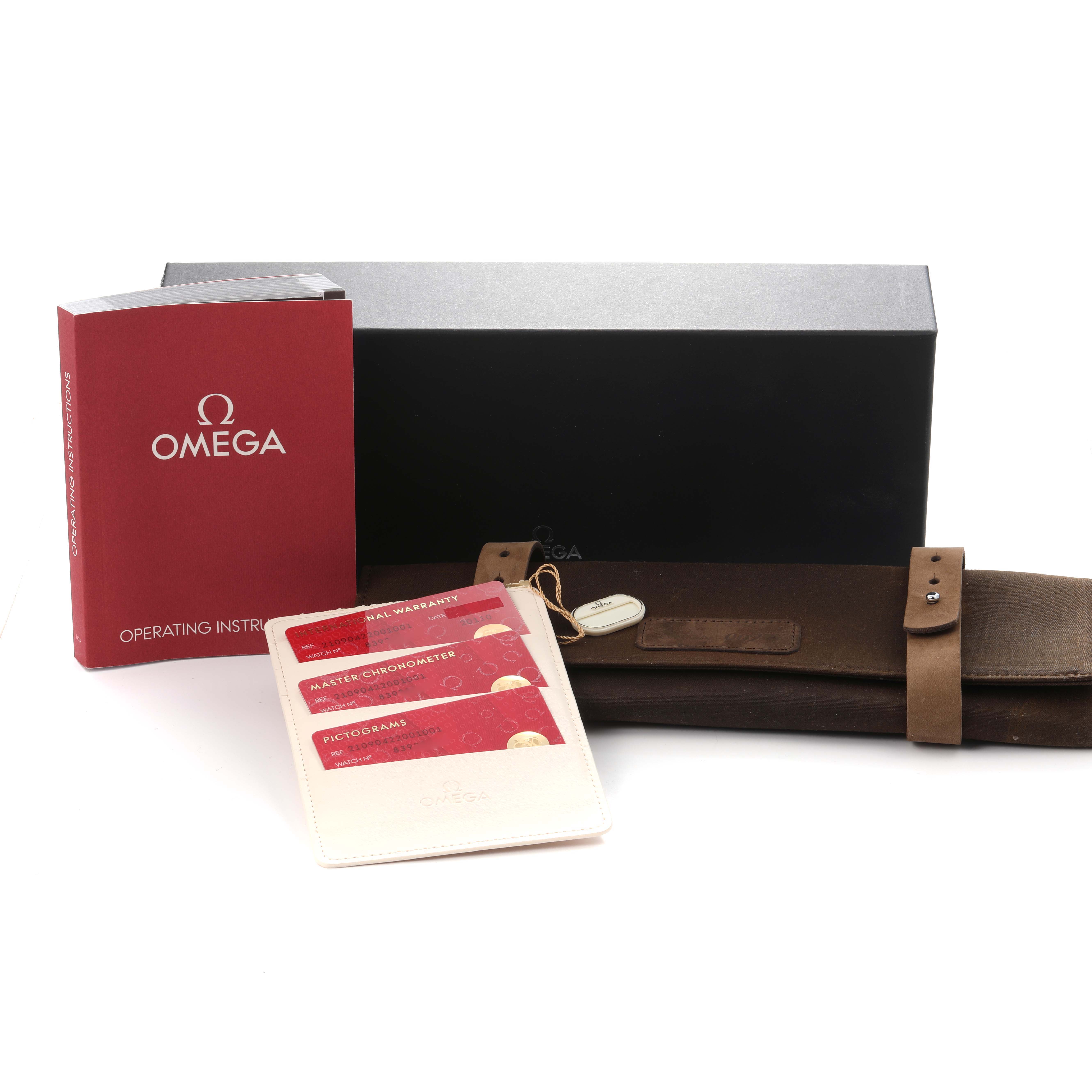 The image shows Omega Seamaster 210.90.42.20.01.001 Men
s Titanium Brown Dial 210.90.42.20.01.001 Men
s Titanium Brown Dial accessories: a black box, brown watch roll, operating instructions, and warranty cards.