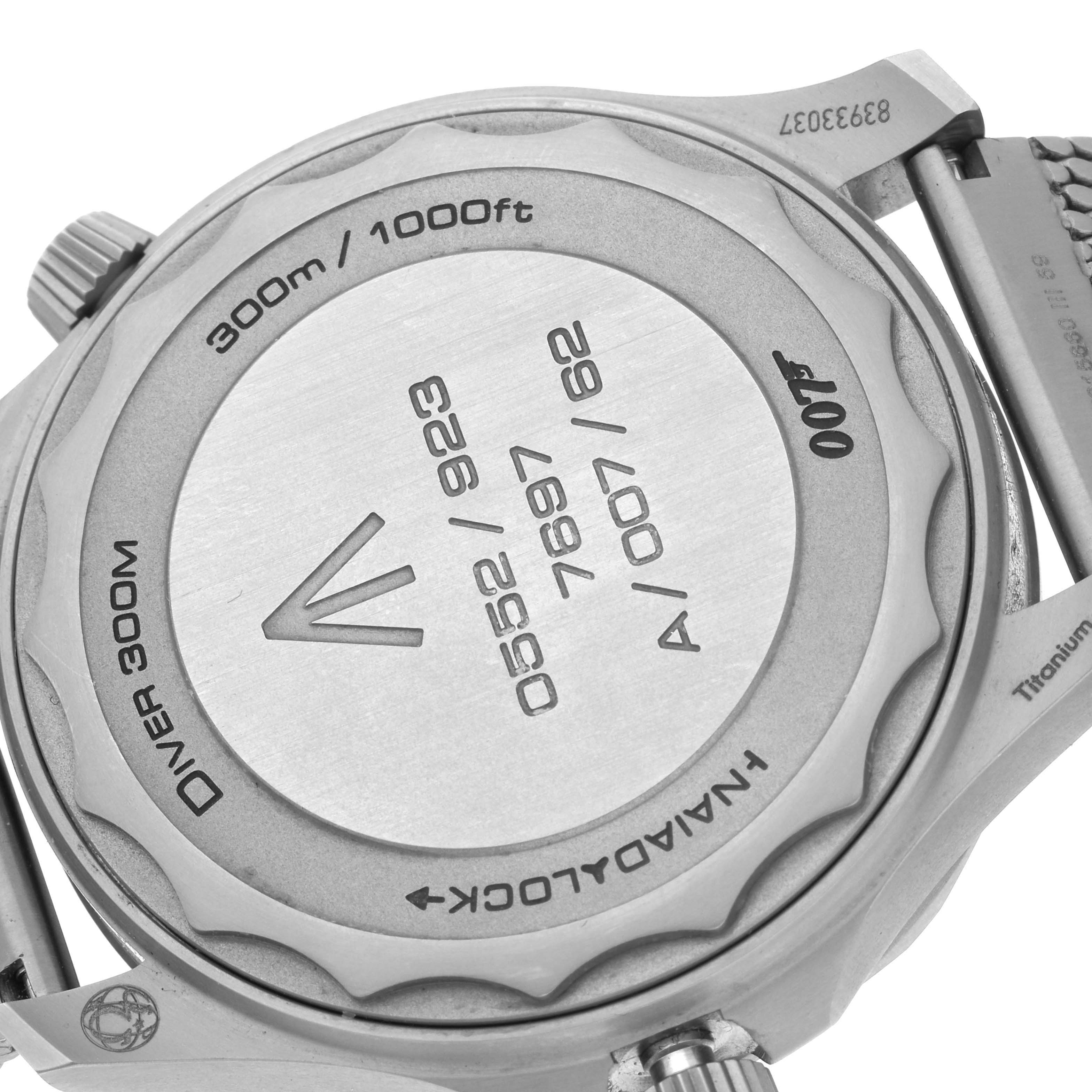 The image shows the case back of an Omega Seamaster 210.90.42.20.01.001 Men
s Titanium Brown Dial 210.90.42.20.01.001 Men
s Titanium Brown Dial, highlighting details like "DIVER 300M" and "Naiad Lock."