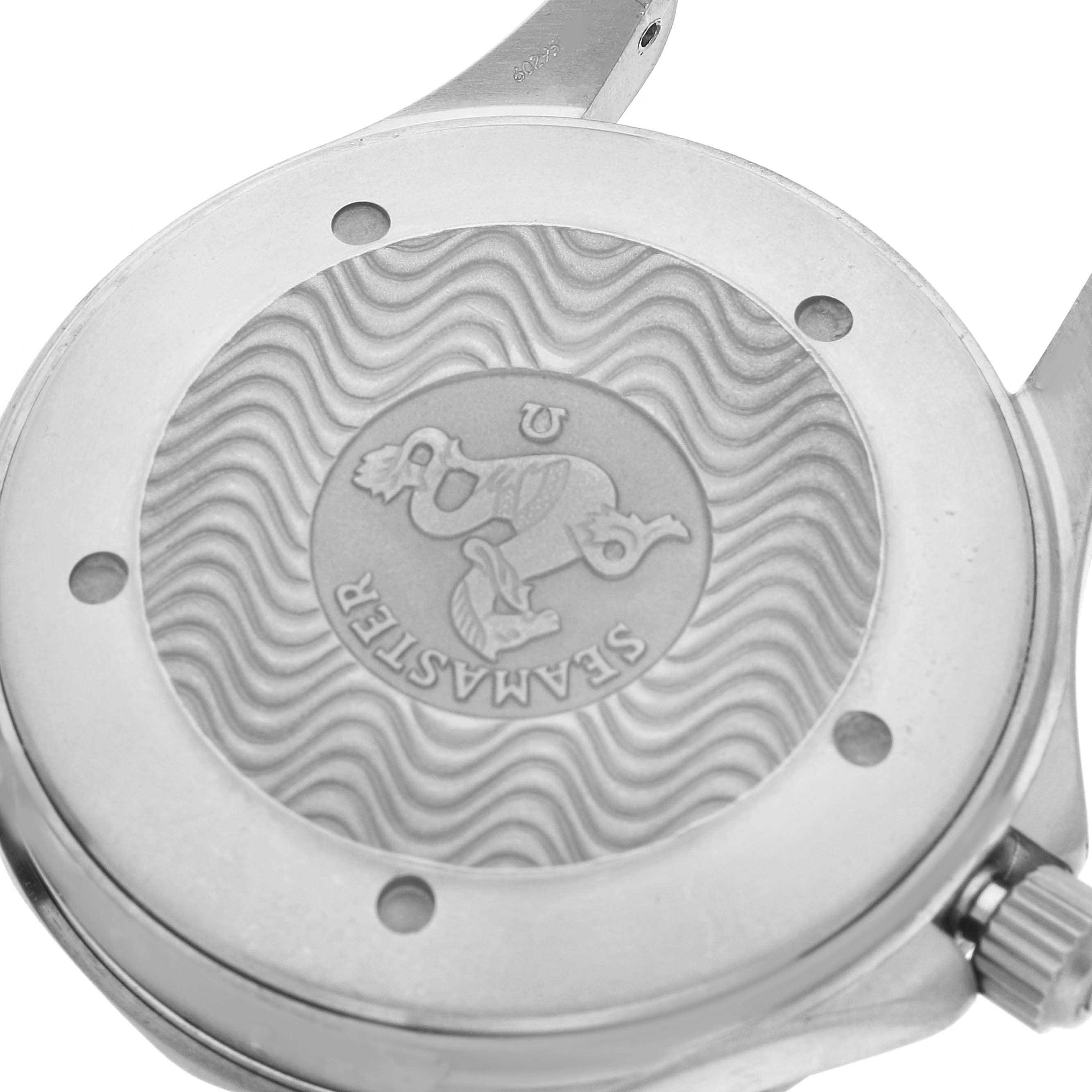 This image shows the back case of an Omega Seamaster 2231.80.00 Men's Titanium Blue Dial 2231.80.00 Men's Titanium Blue Dial watch, highlighting its engraved logo and wave pattern.