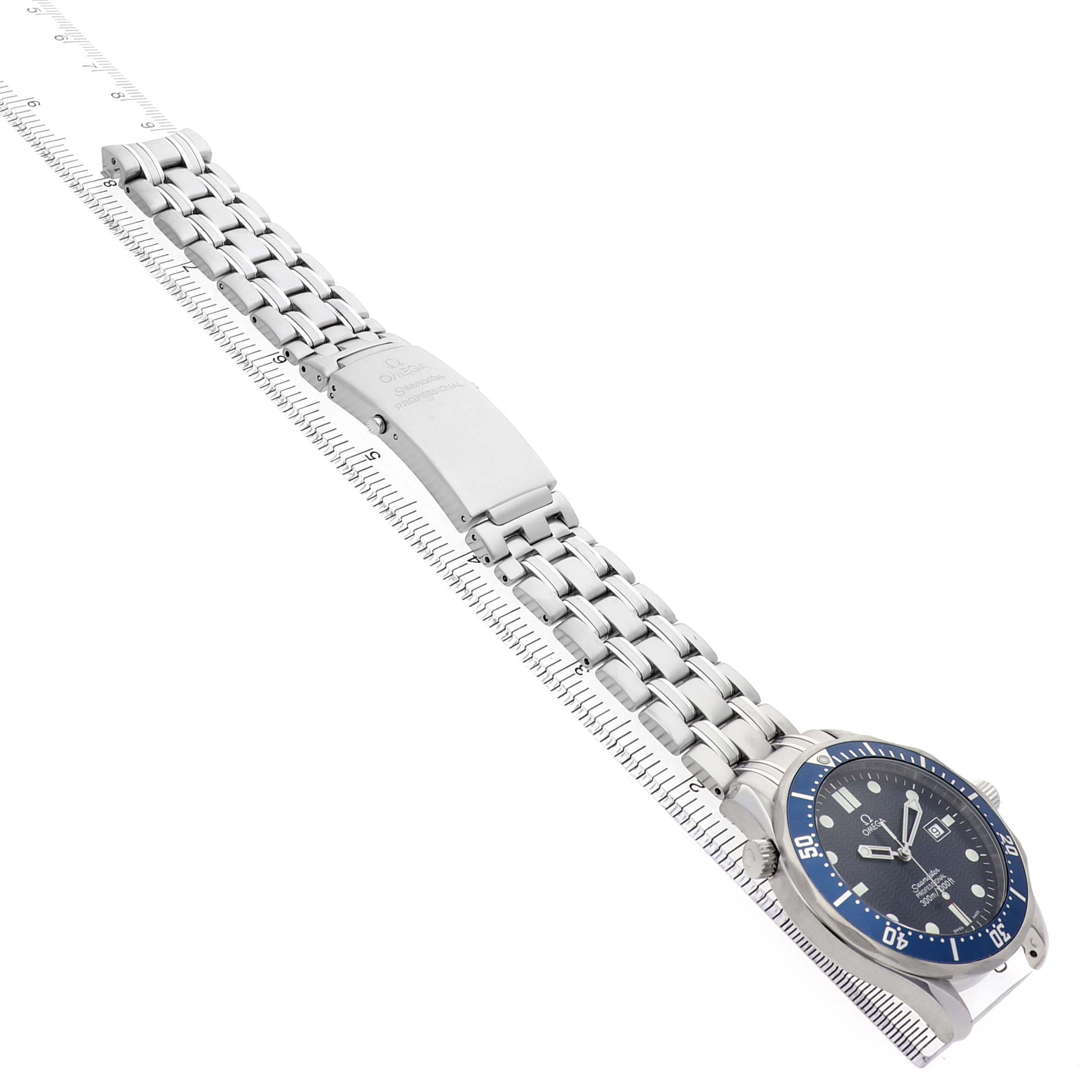 The image shows the Omega Seamaster 2541.80.00 Men's Stainless Steel Blue Dial watch at an angled side view, highlighting the bracelet, clasp, and blue bezel.