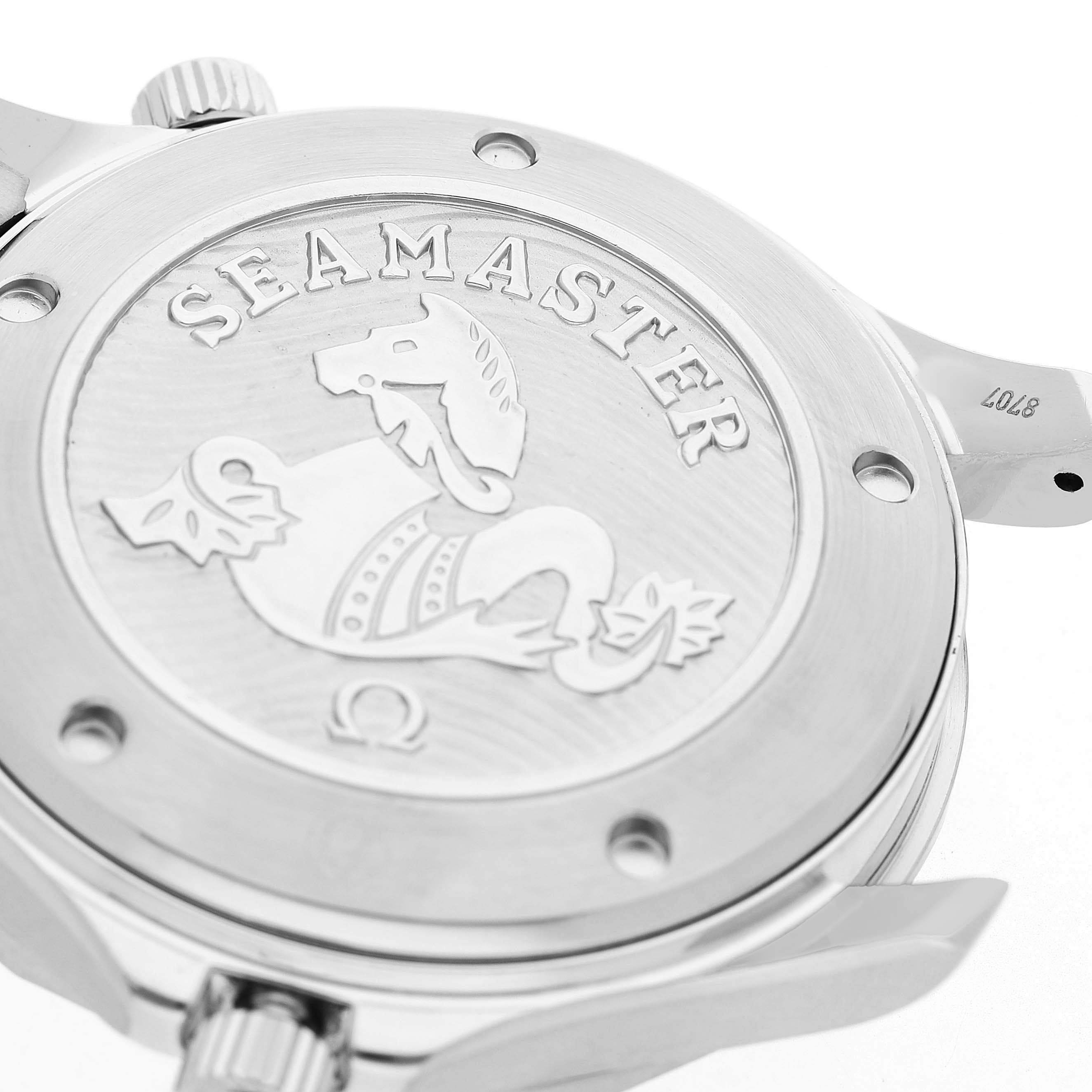 The image shows the case back of an Omega Seamaster 212.30.41.20.03.001 Men's Stainless Steel Blue Dial watch, featuring an engraved emblem and surrounding screws.