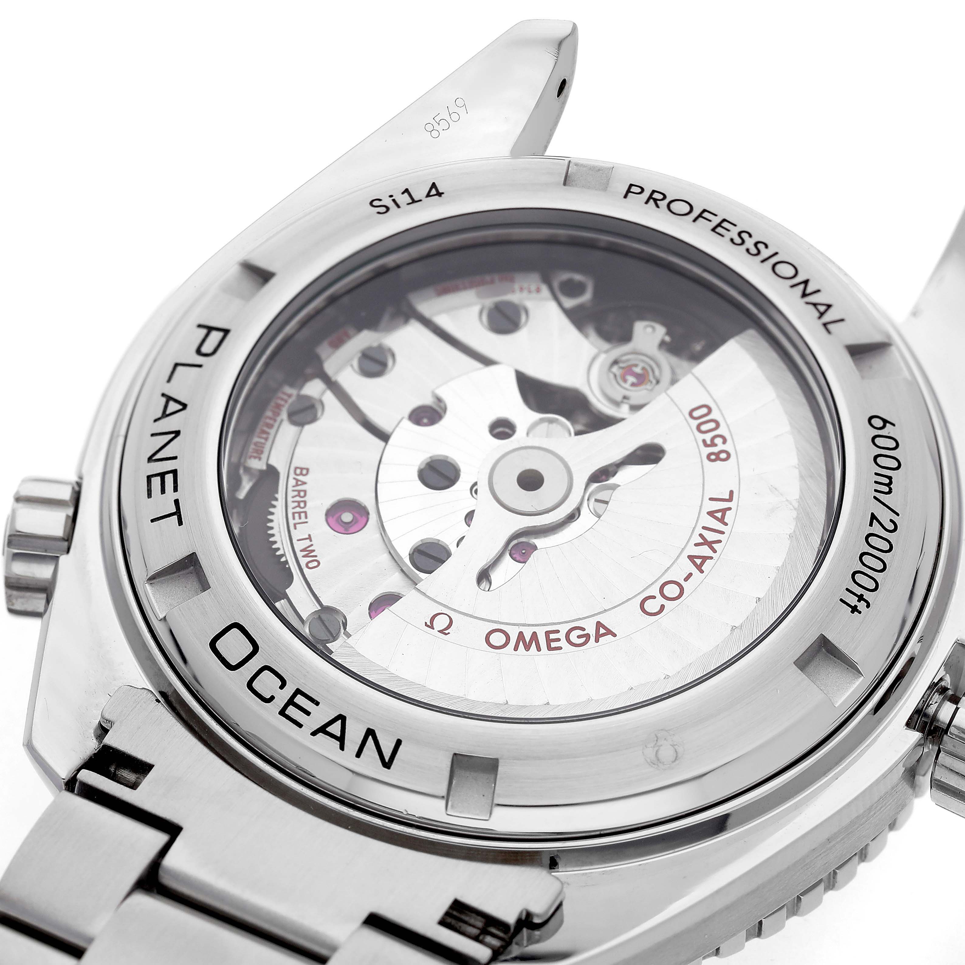 The image shows the back of the Omega Planet Ocean 232.30.46.21.01.001 Men's Stainless Steel Black Dial watch, highlighting its transparent case back and mechanical movement.