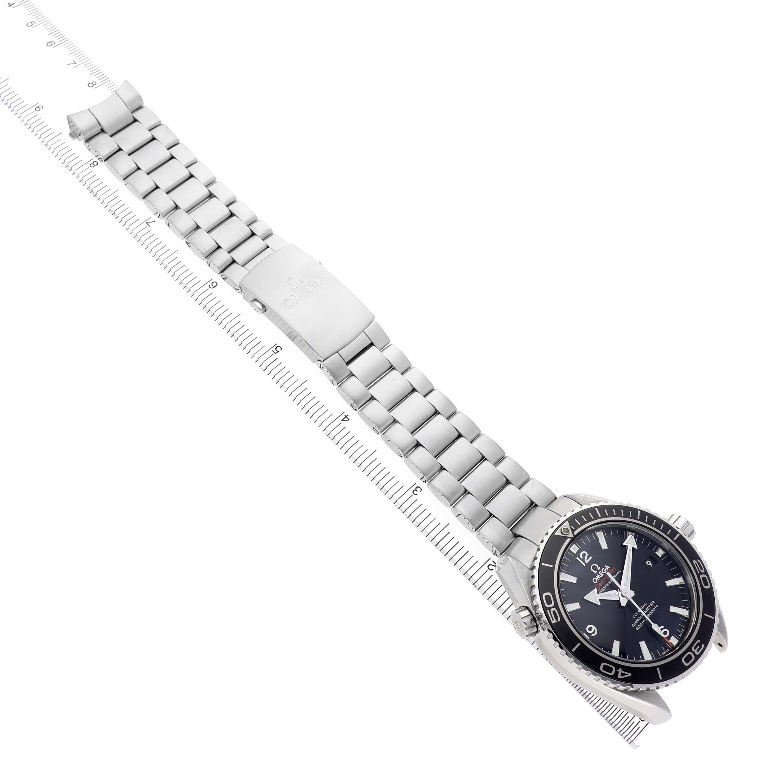 The Omega Planet Ocean 232.30.46.21.01.001 Men's Stainless Steel Black Dial watch is shown at an angled top view, displaying the dial, bezel, and full metal bracelet with clasp.