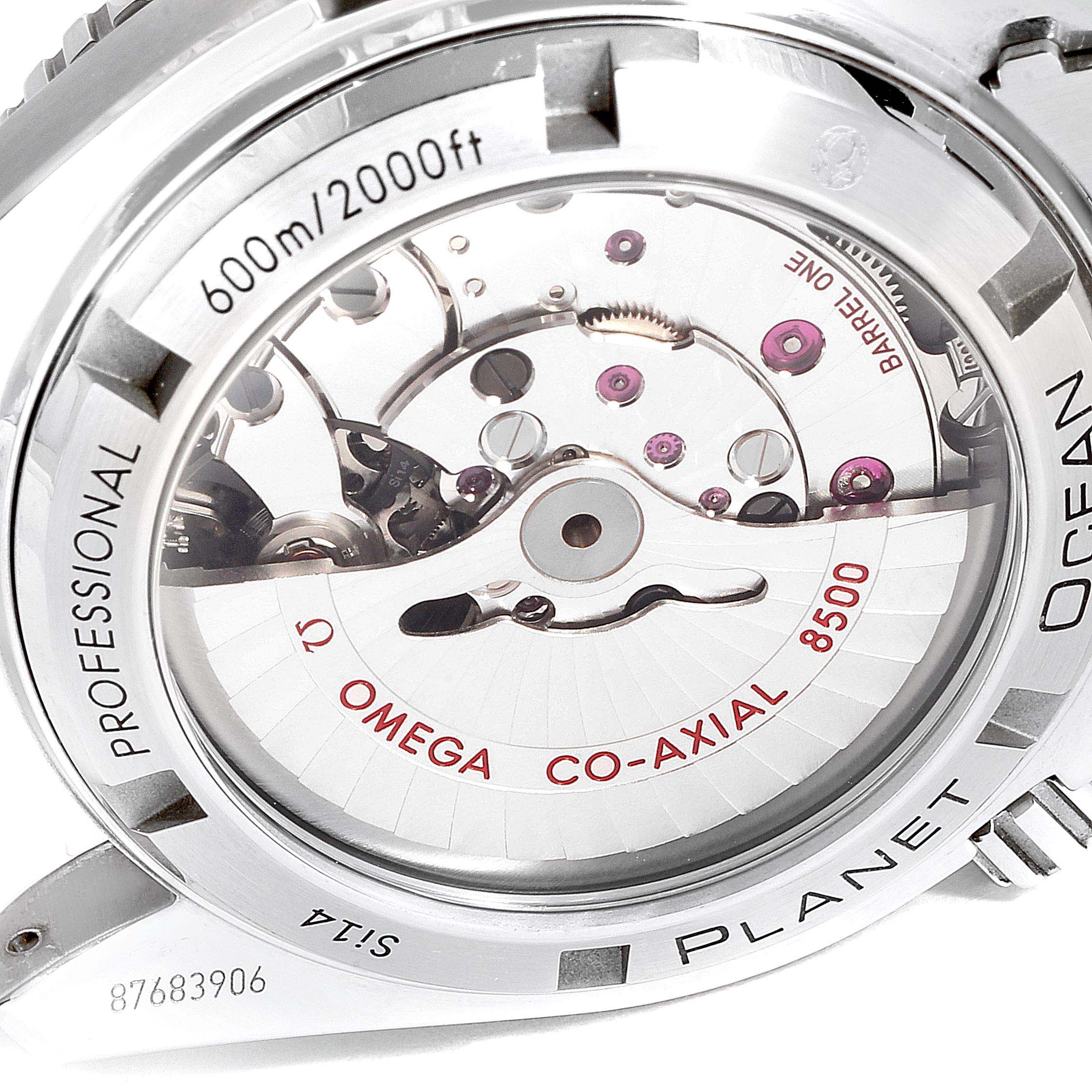 The image shows the back of an Omega Planet Ocean 232.30.42.21.01.003 Men
s Stainless Steel Black Dial 232.30.42.21.01.003 Men
s Stainless Steel Black Dial watch, highlighting its Omega Co-Axial 8500 movement mechanism.