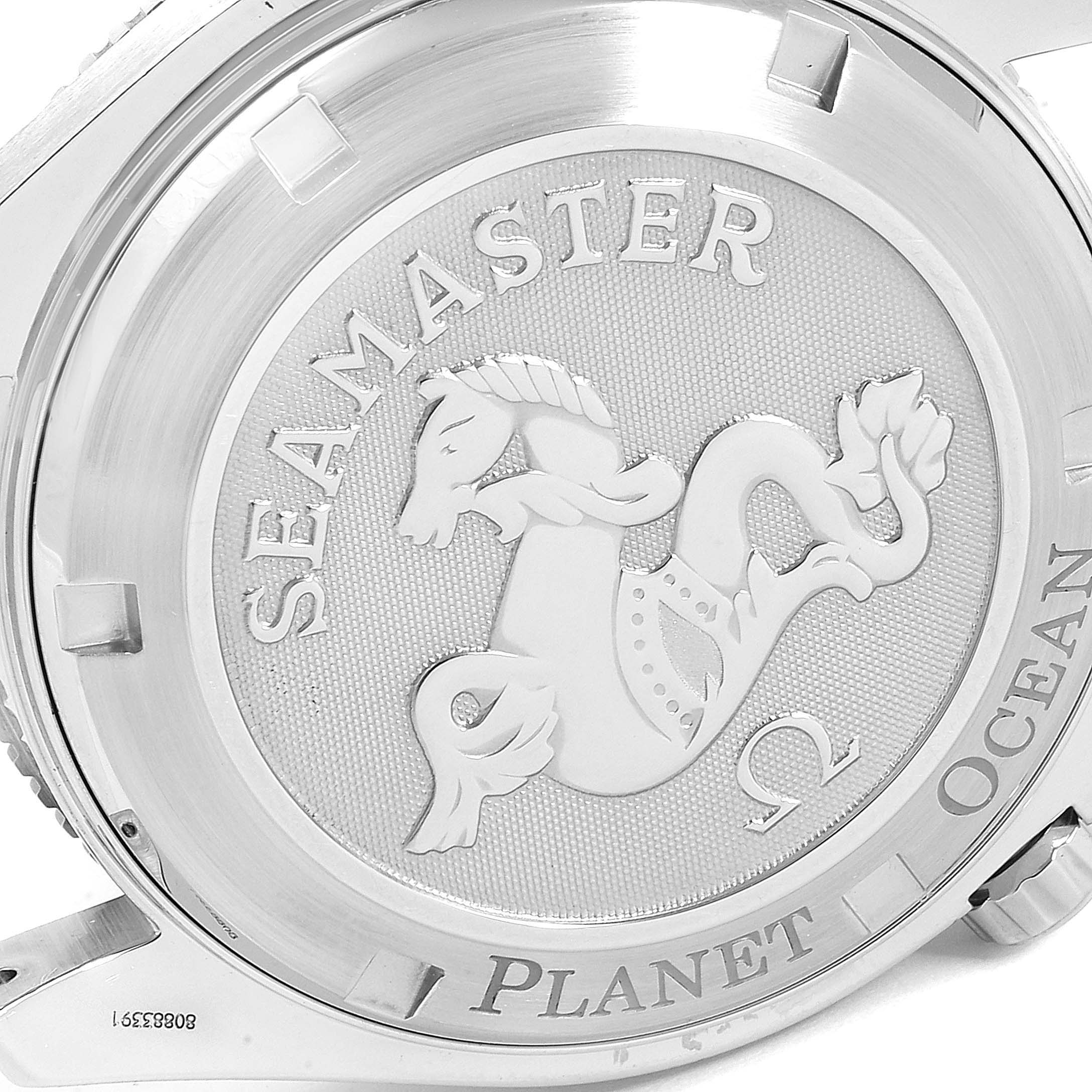 The image shows the case back of the Omega Planet Ocean 2209.50.00 Men
s Stainless Steel Black Dial 2209.50.00 Men
s Stainless Steel Black Dial Seamaster watch with the Omega logo and seahorse engraving.