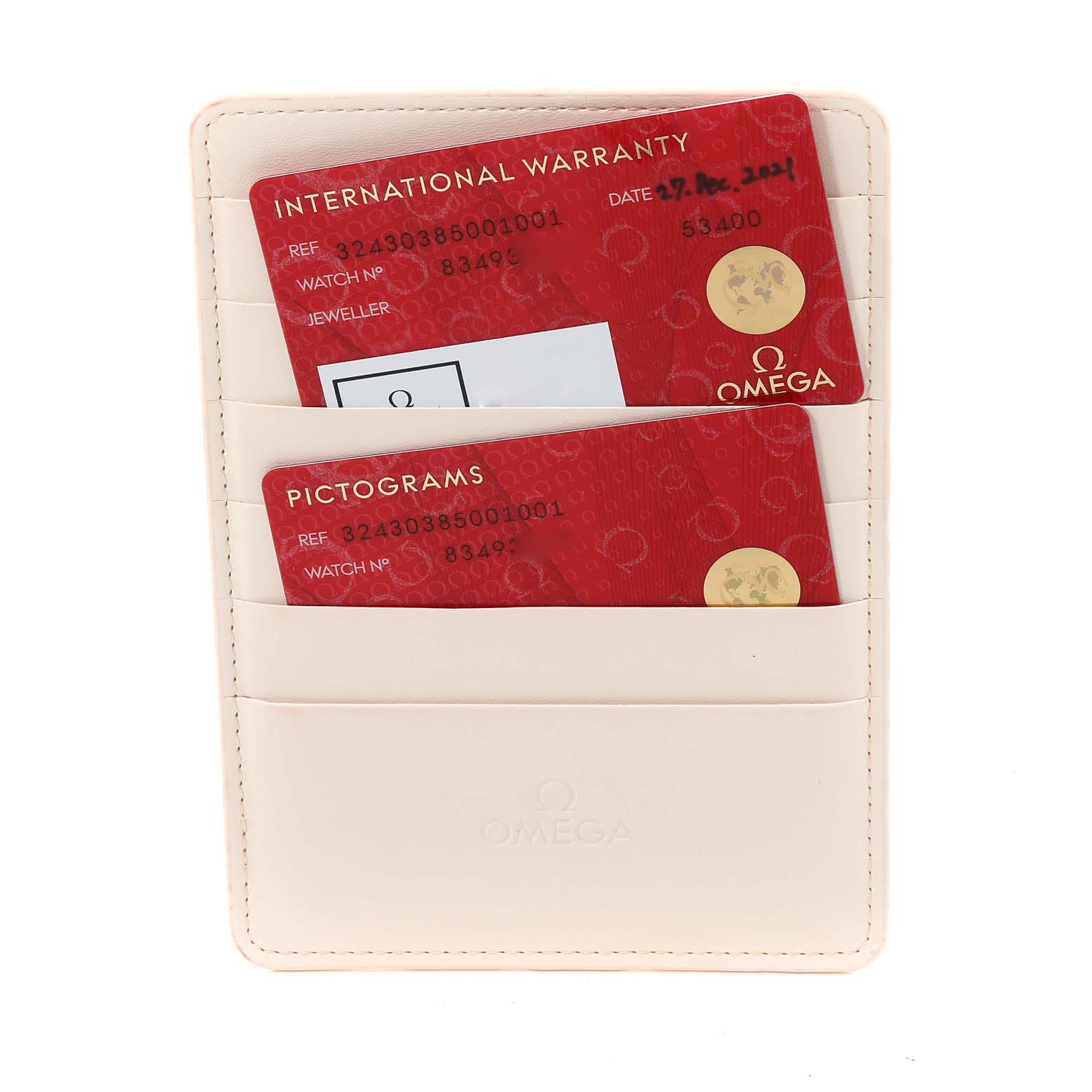 The image shows warranty and pictogram cards for an Omega Speedmaster 324.30.38.50.01.001 Men's Stainless Steel Black Dial 324.30.38.50.01.001 Men's Stainless Steel Black Dial watch in a white cardholder.