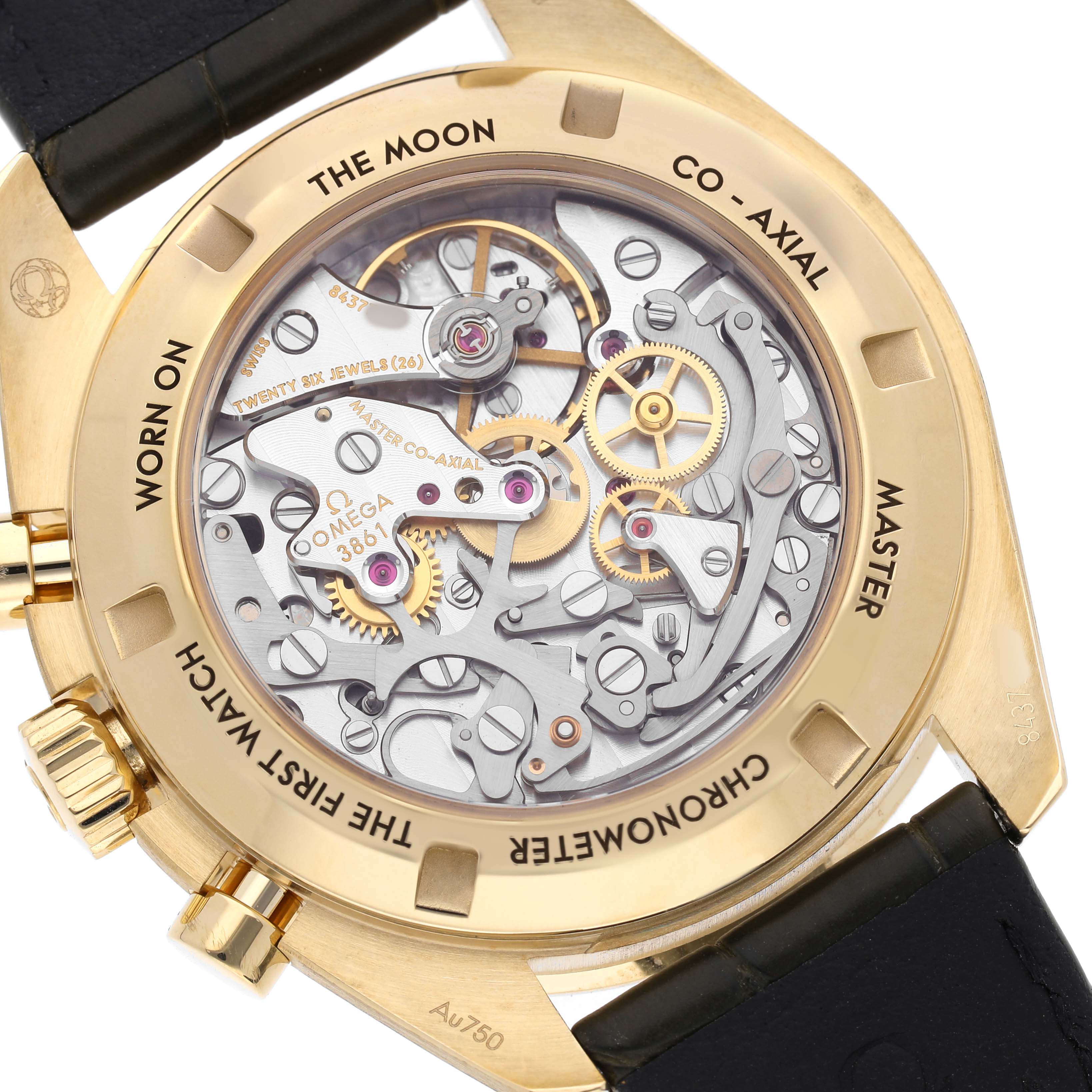 The image shows the back of an Omega Speedmaster 310.63.42.50.10.001 Men's Yellow Gold Black Dial, highlighting its intricate movement and "Co-Axial" mechanism.