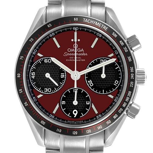 The Omega Speedmaster 326.30.40.50.11.001 Men's Stainless Steel Red Dial watch is shown from a front angle, highlighting the dial, bezel, and chronograph subdials.