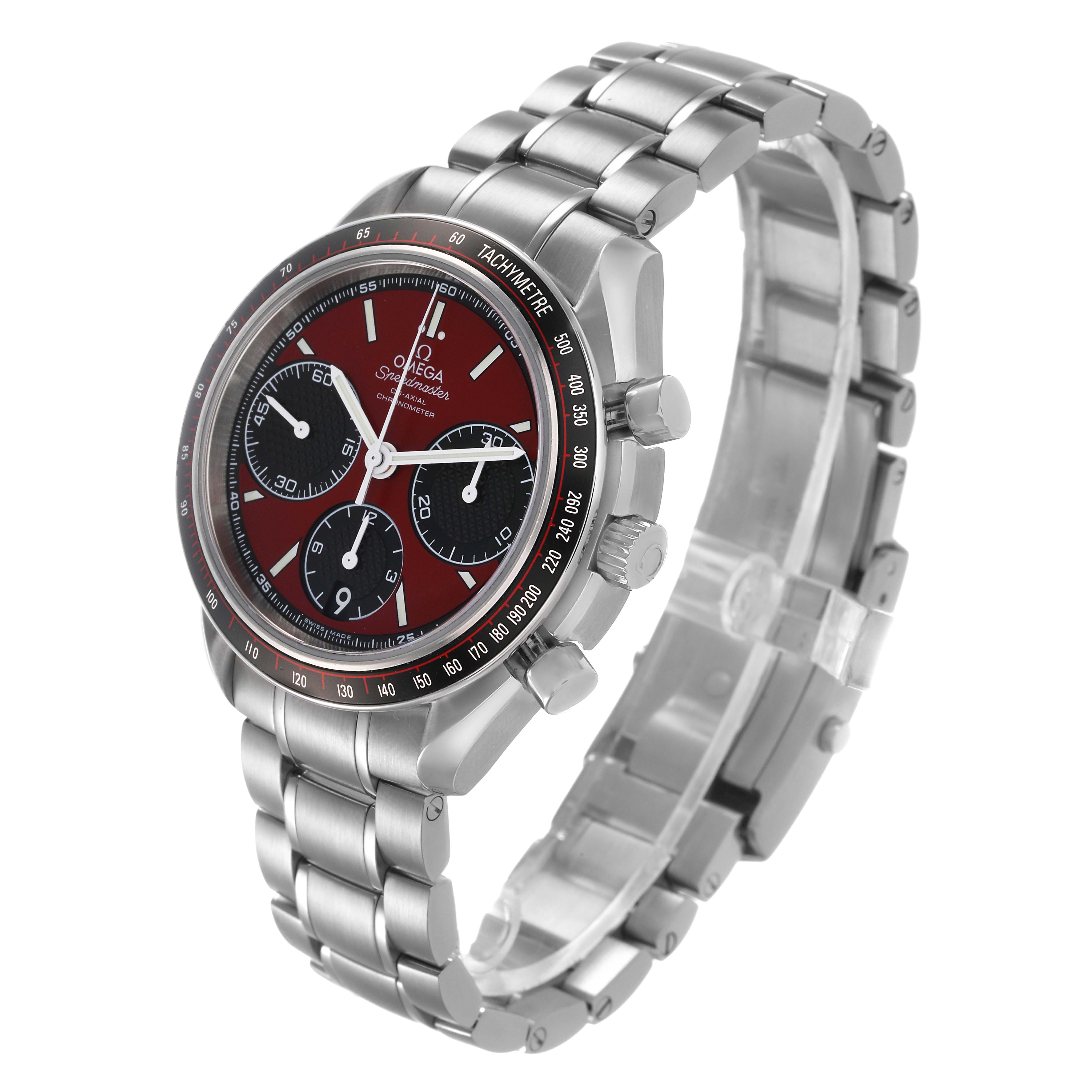 The Omega Speedmaster 326.30.40.50.11.001 Men's Stainless Steel Red Dial watch is shown at a three-quarter angle displaying the dial, bezel, and bracelet.