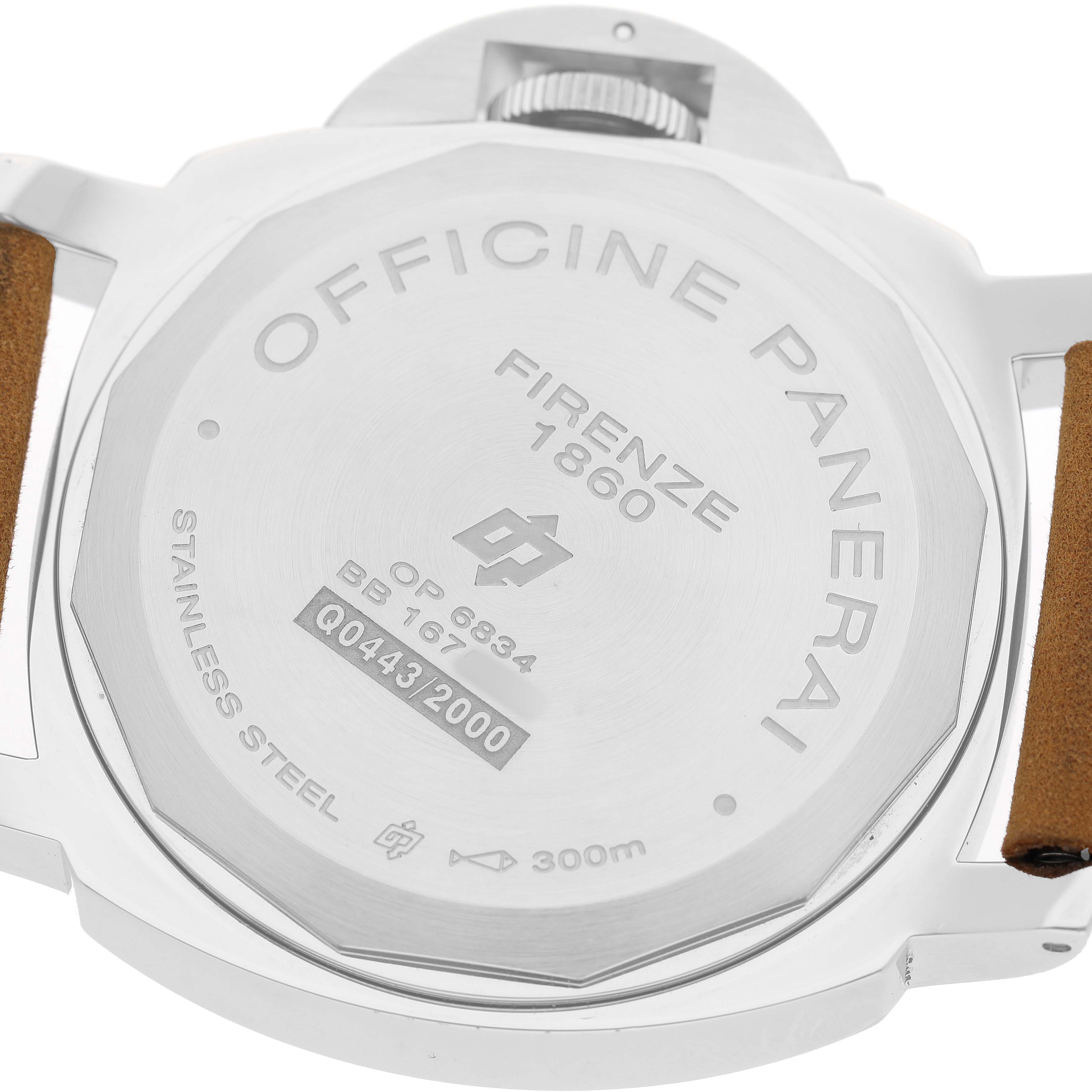 The image shows the back case of a Panerai Luminor PAM00000 Men's Stainless Steel Black Dial watch, highlighting engravings and the crown from the side.