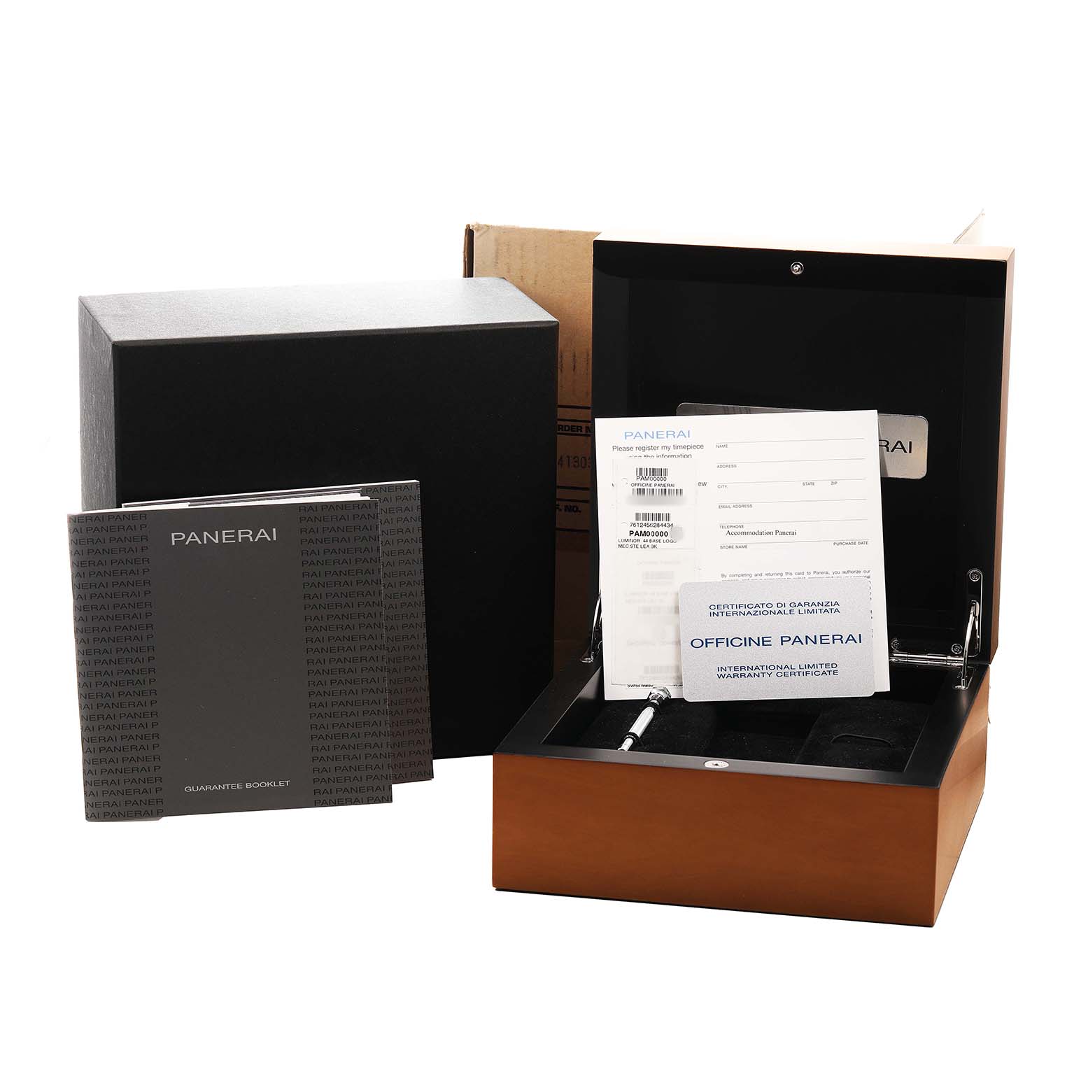 The image shows a Panerai Luminor PAM00000 Men's Stainless Steel Black Dial box with documentation and a warranty booklet, viewed from the front with some open compartments.