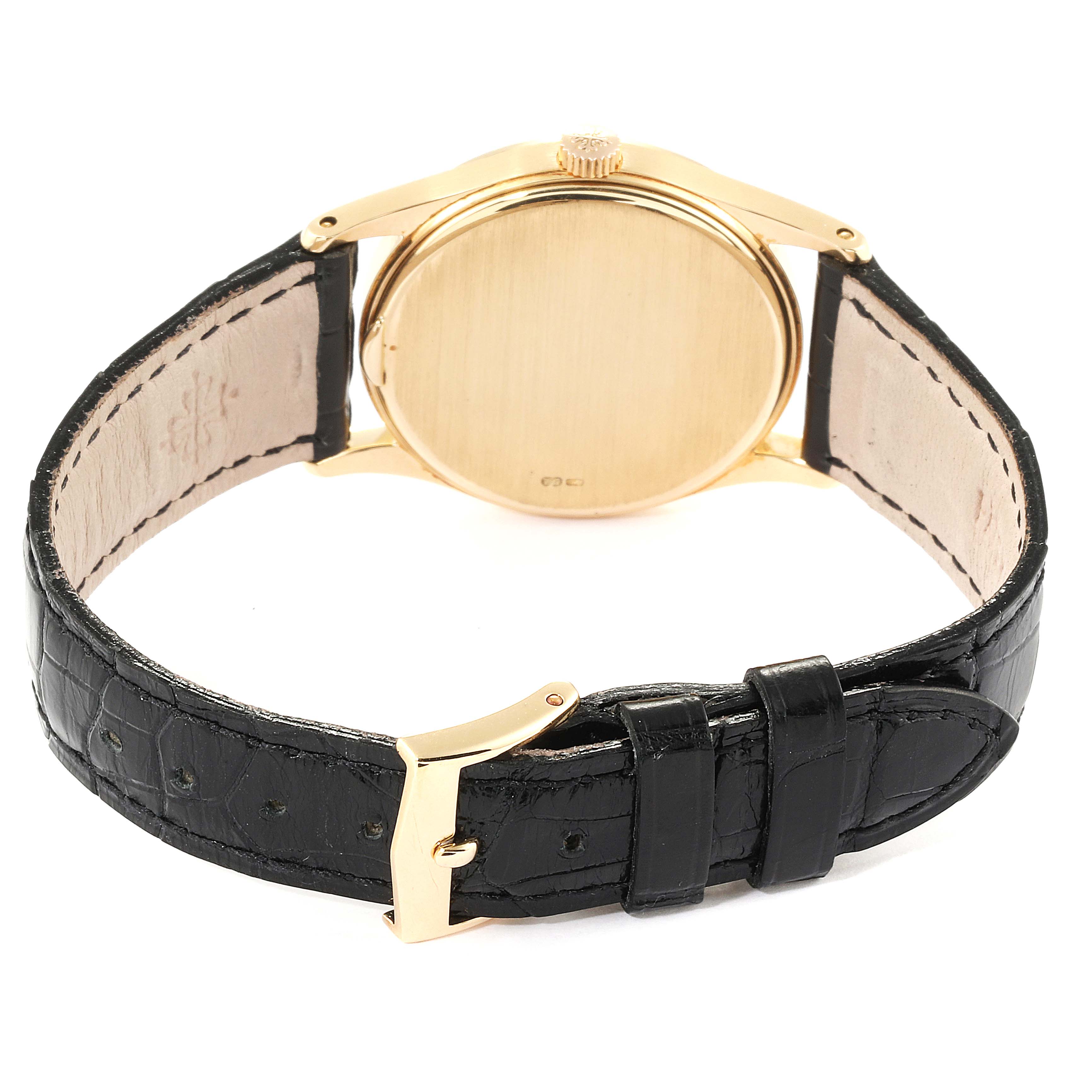 The image shows the back view and leather strap of a Vintage Patek Philippe watch.