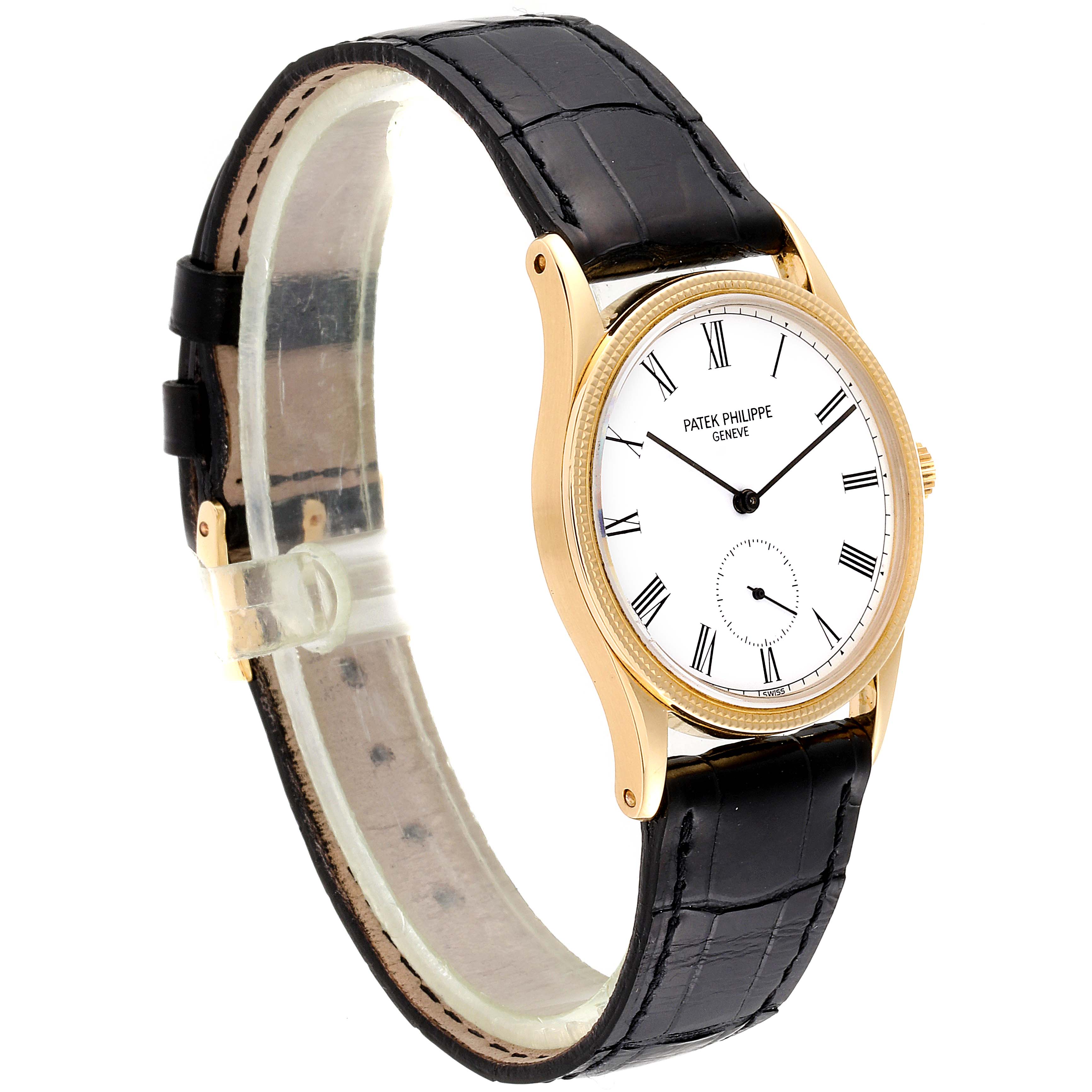 The image shows a Patek Philippe Vintage model watch, angled slightly to the left, featuring a gold case, black leather strap, and Roman numeral dial.