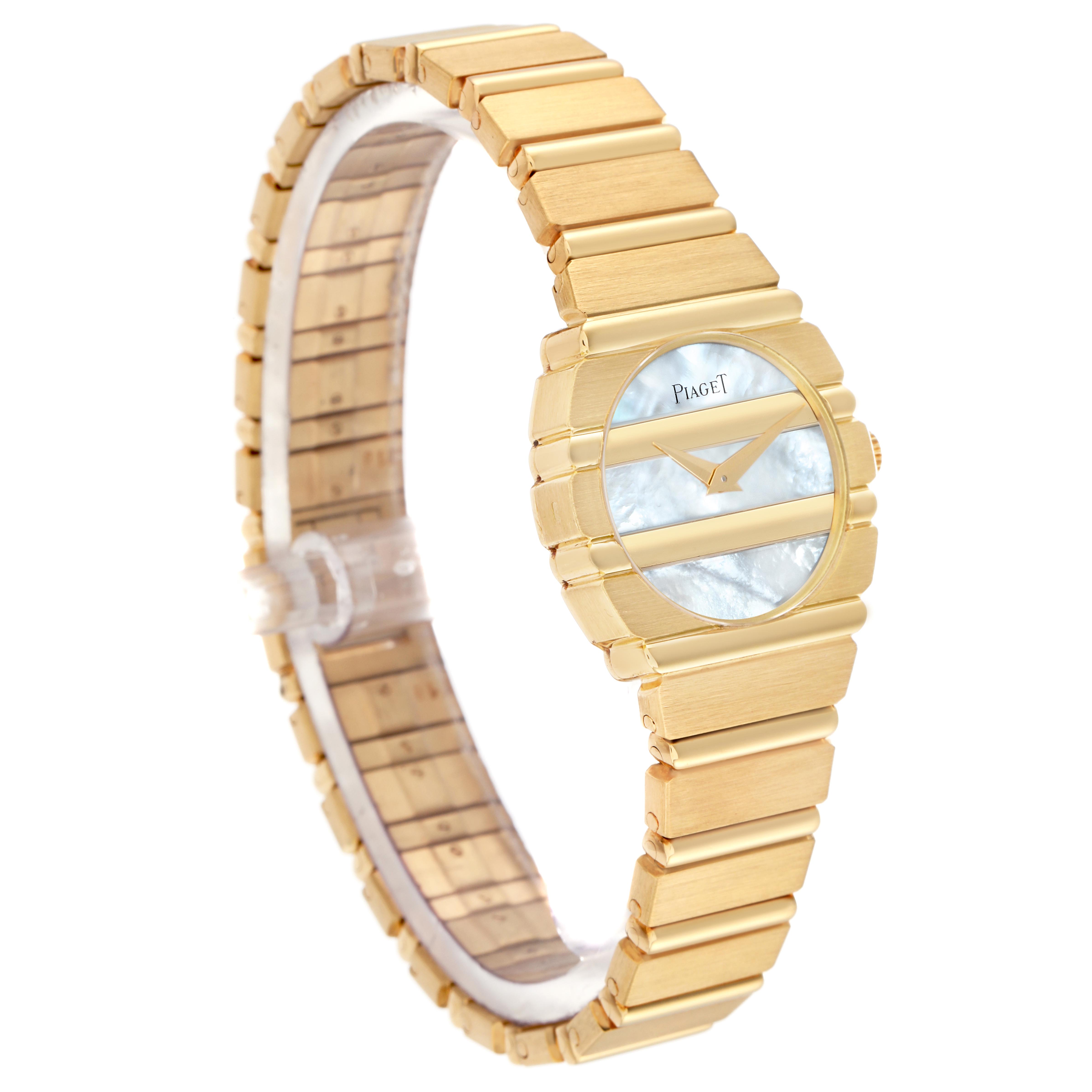 The Piaget 8610701 Women
s Yellow Gold Mother of Pearl Dial 8610701 Women
s Yellow Gold Mother of Pearl Dial Polo 8610701 watch is shown at a three-quarter angle, highlighting the yellow gold band and mother of pearl dial.