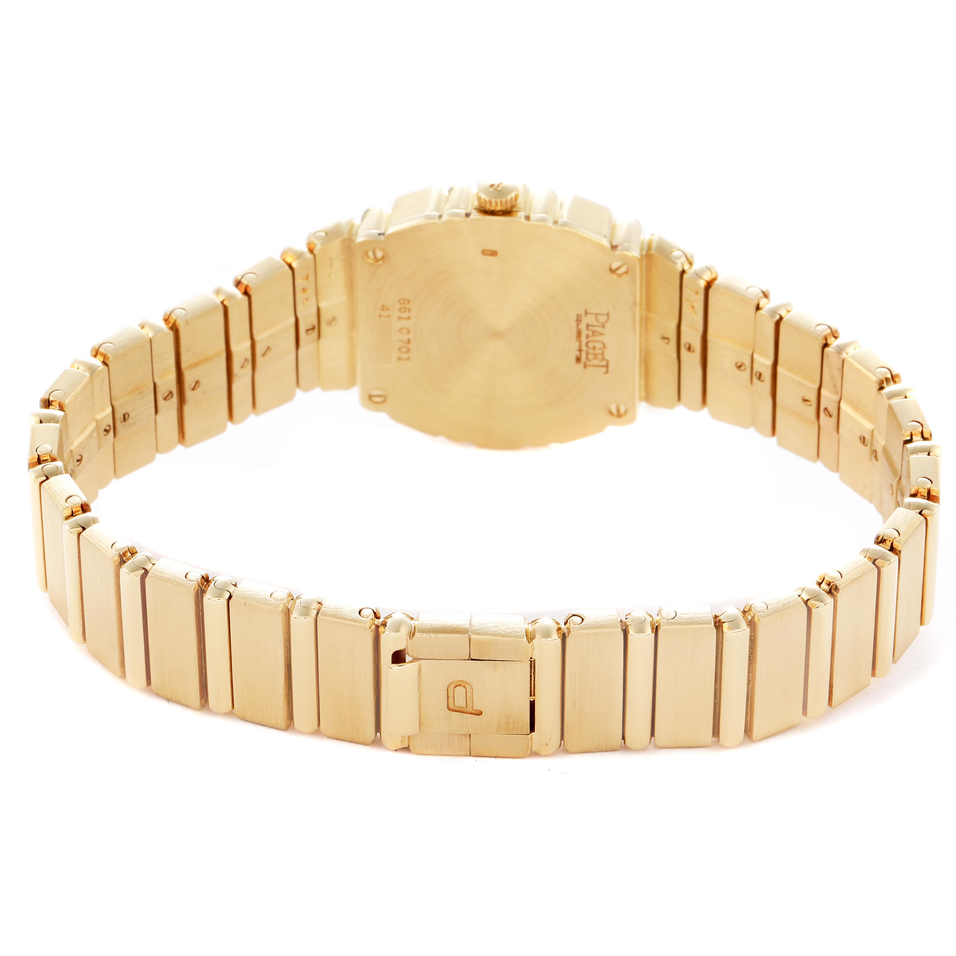 The Piaget 8610701 Women
s Yellow Gold Mother of Pearl Dial 8610701 Women
s Yellow Gold Mother of Pearl Dial Polo Yellow Gold 8610701 is shown from the back, displaying the clasp and bracelet in detail.