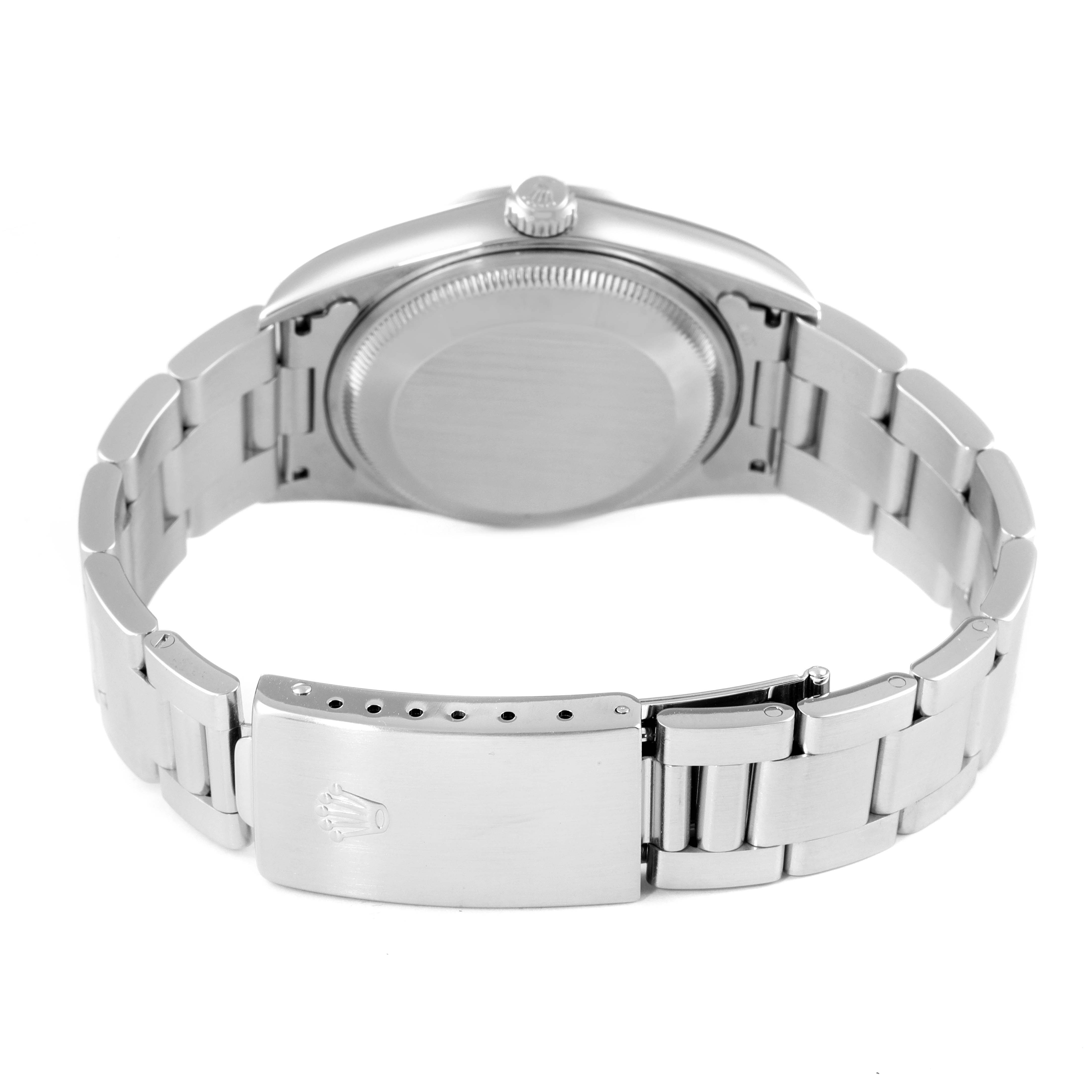 This image shows the backside, clasp, and bracelet of a Rolex Date 15200 Men's Stainless Steel Pink Dial 15200 Men's Stainless Steel Pink Dial model watch.