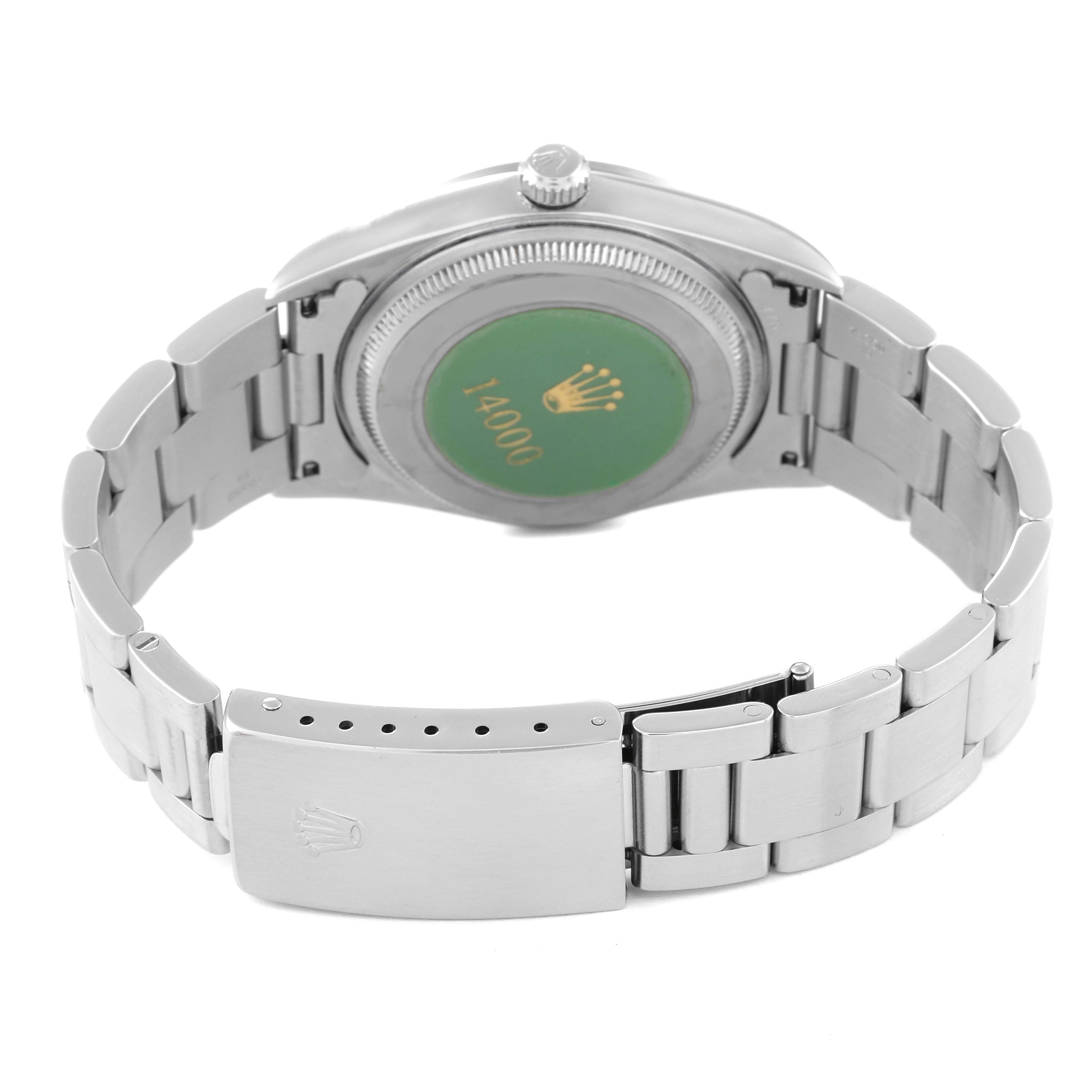 This image shows the back and part of the bracelet of a Rolex Air-King 14000 Men's Stainless Steel Pink Dial 14000 Men's Stainless Steel Pink Dial watch.