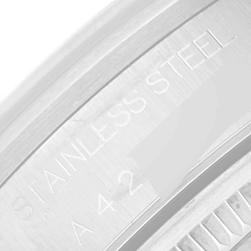 The image shows a close-up of the stainless steel back casing of the Rolex Air-King 14000 Men's Stainless Steel Pink Dial 14000 Men's Stainless Steel Pink Dial watch.