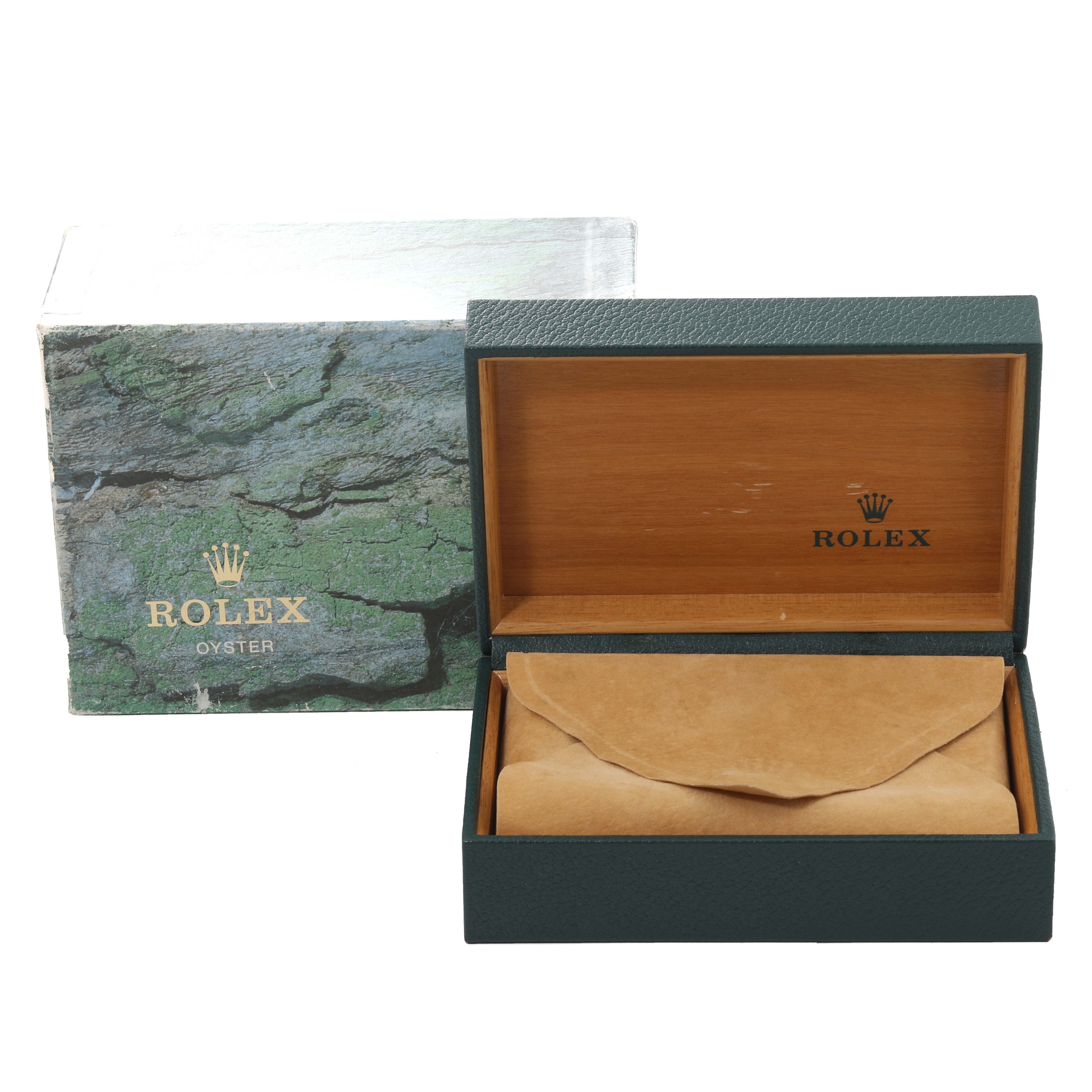 The image shows the packaging for the Rolex Air-King 14000 Men's Stainless Steel Pink Dial 14000 Men's Stainless Steel Pink Dial watch, including an open green box and a brown leather case inside.