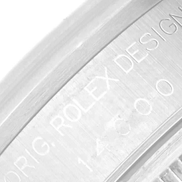 This close-up shows the engraved "ROLEX DESIGN" on the case back of the Rolex Air-King 14000 Men's Stainless Steel Pink Dial 14000 Men's Stainless Steel Pink Dial watch.