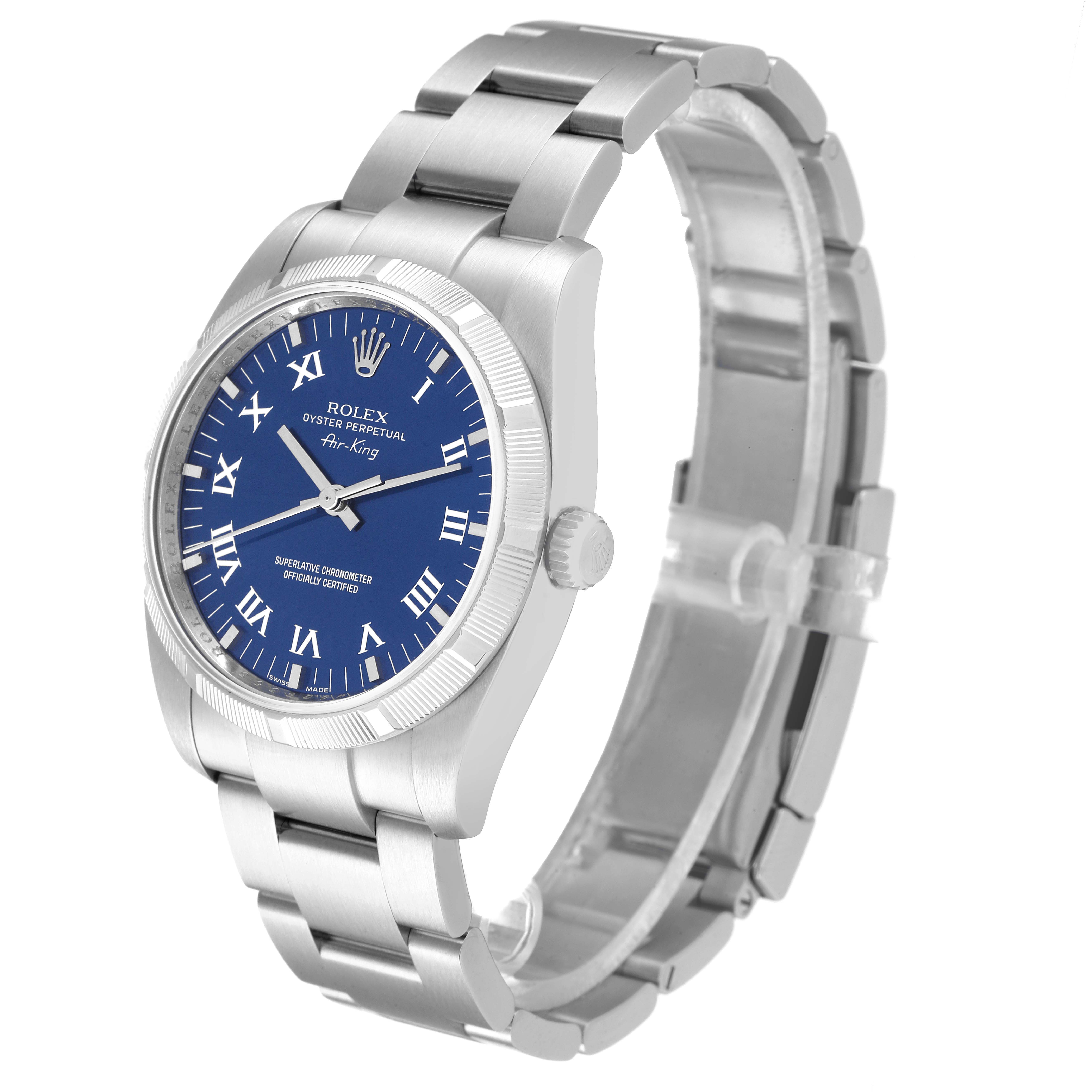 The image shows a Rolex Air-King 114210 Men's Stainless Steel Blue Dial 114210 Men's Stainless Steel Blue Dial watch from an angled view, highlighting its blue dial, Roman numerals, and metal bracelet.