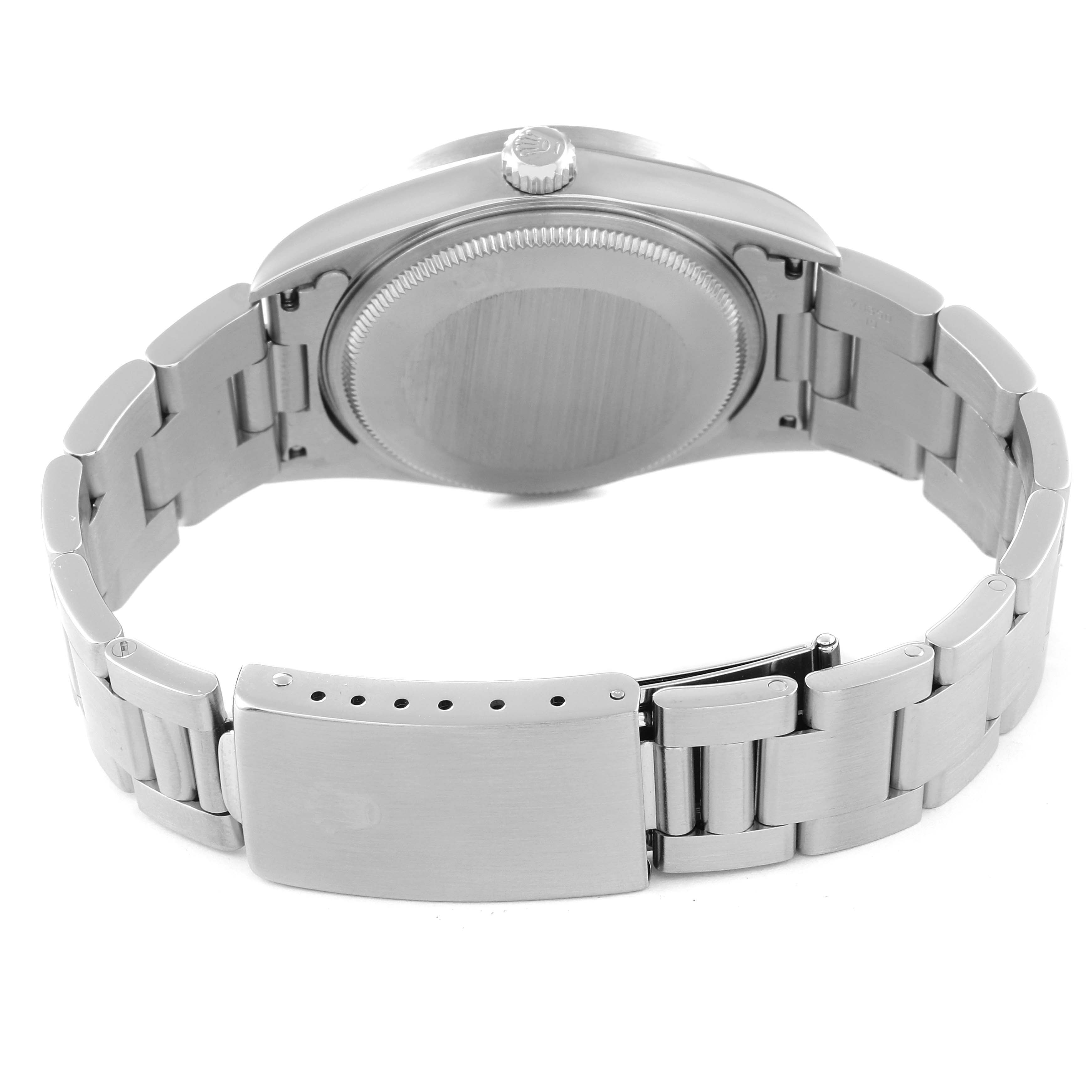This image shows the back view of the Rolex Air-King 14010 Men's Stainless Steel Silver Dial 14010 Men's Stainless Steel Silver Dial watch, highlighting the case back, bracelet, and clasp.