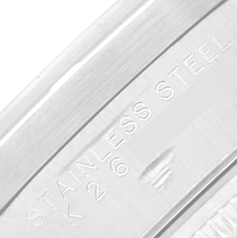 This close-up image shows the stainless steel marking on the case of a Rolex Air-King 14010 Men's Stainless Steel Silver Dial 14010 Men's Stainless Steel Silver Dial watch.