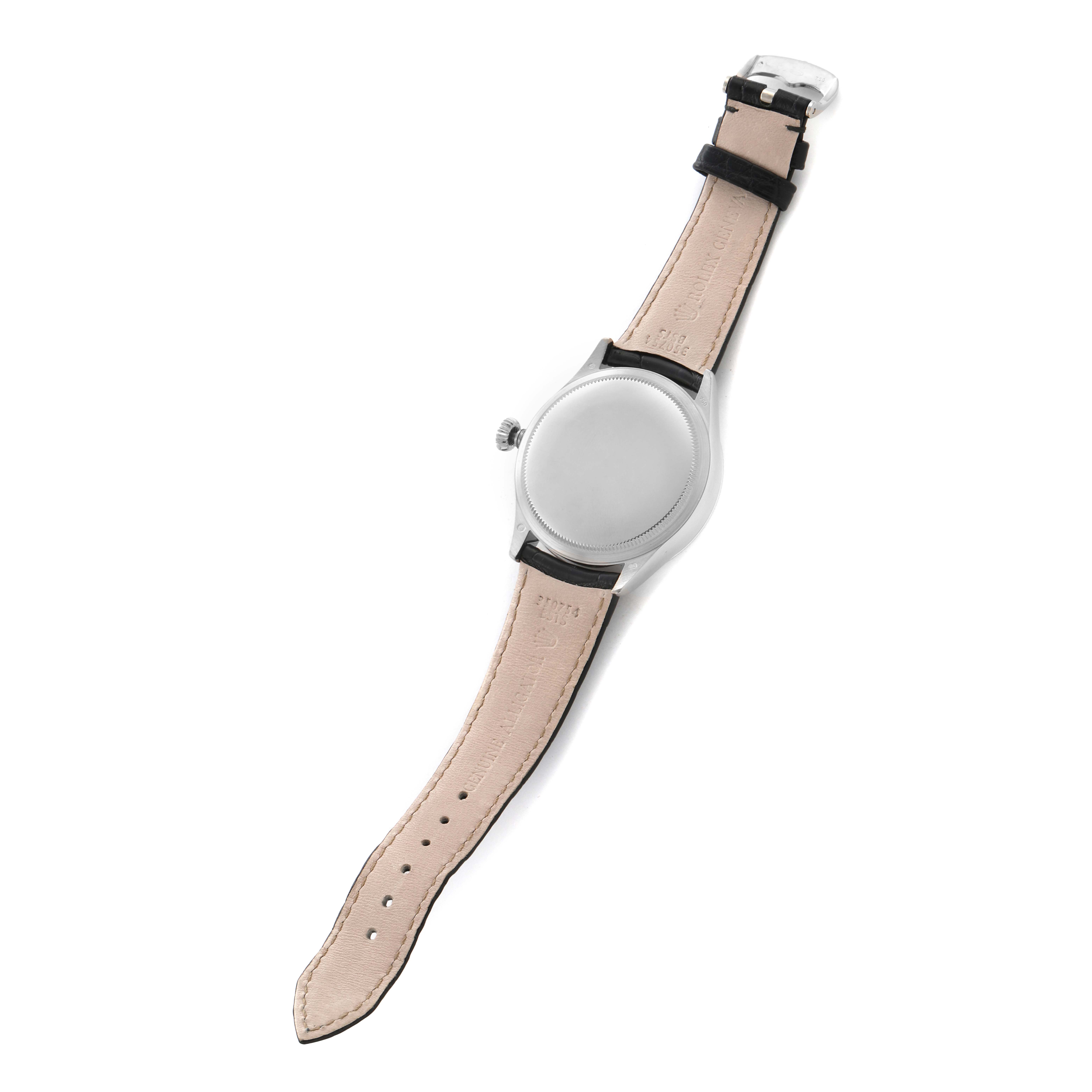 The image shows the back and strap of a Rolex Cellini 50529 Men
s White Gold Silver Dial 50529 Men
s White Gold Silver Dial watch at a slight angle, highlighting the caseback and leather strap.