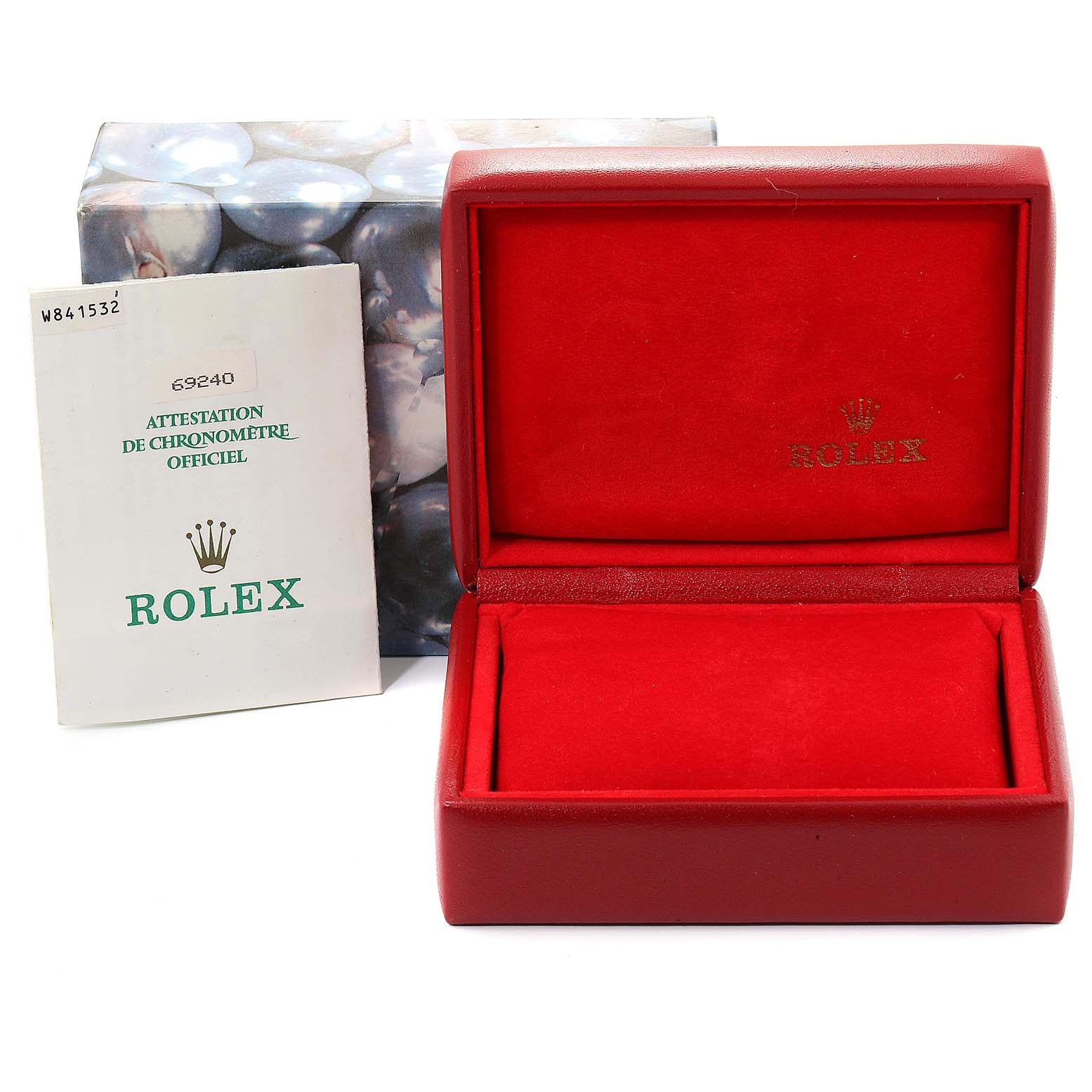 The image shows a red Rolex watch box for the Datejust model, along with a manual and an outer case.