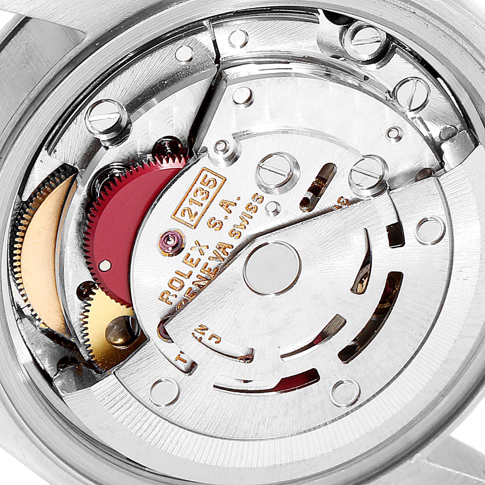 This is a close-up view of the movement mechanism of a Rolex Datejust 69240  Women
s Stainless Steel Silver Dial 69240  Women
s Stainless Steel Silver Dial watch, showcasing its intricate internal components.