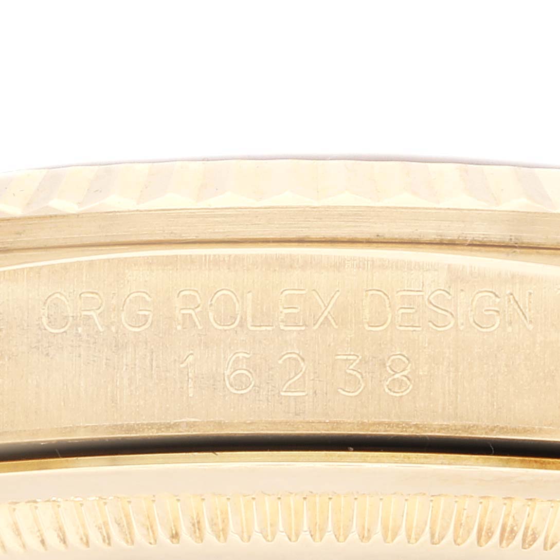 The image shows an edge-close-up angle of the bezel and engraved case back of a Rolex President 16238 Men
s Yellow Gold Champagne Dial 16238 Men
s Yellow Gold Champagne Dial model watch.